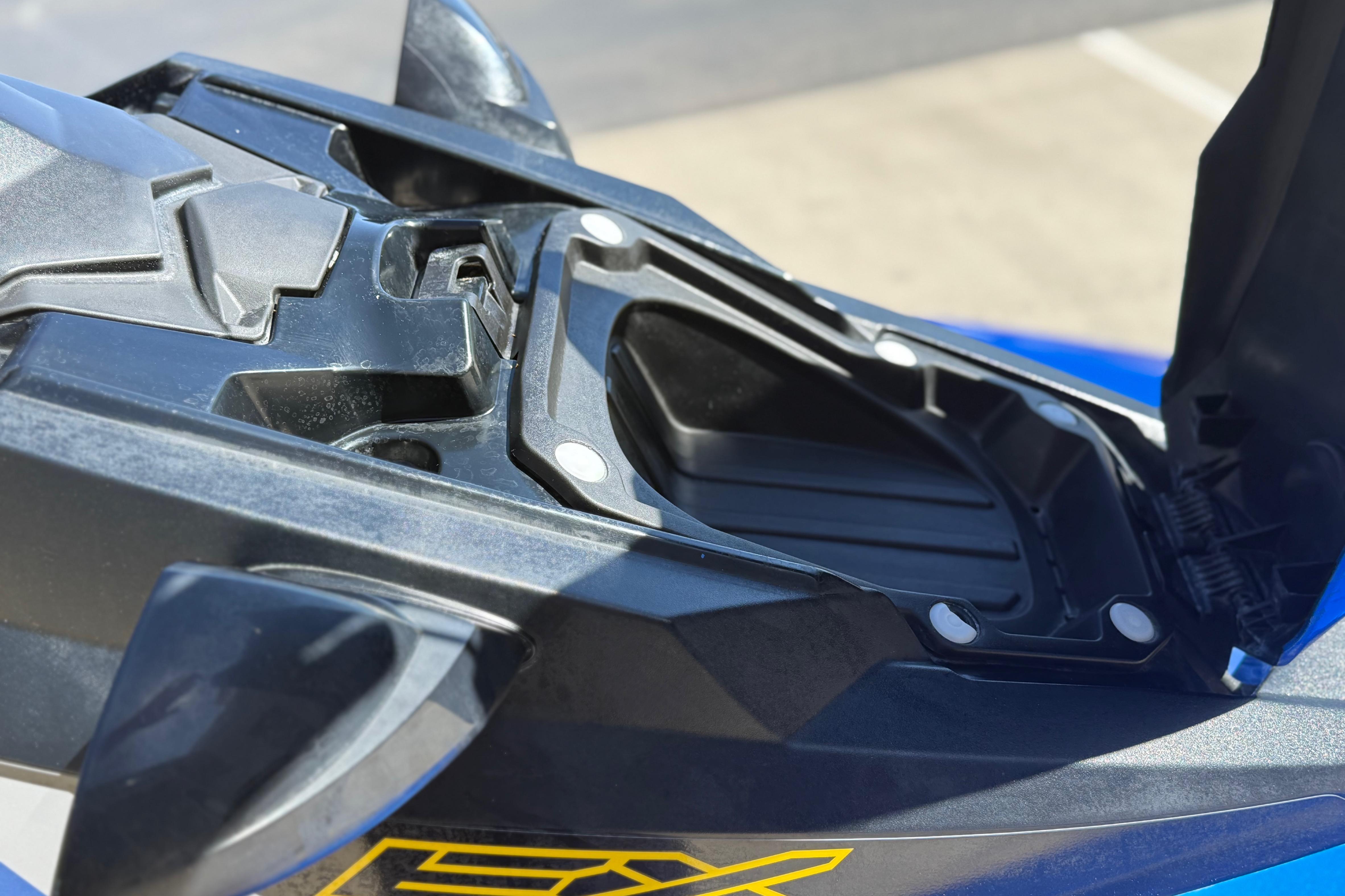 2017 Yamaha WaveRunner EX Deluxe storage compartment, open and empty, showcasing interior design.