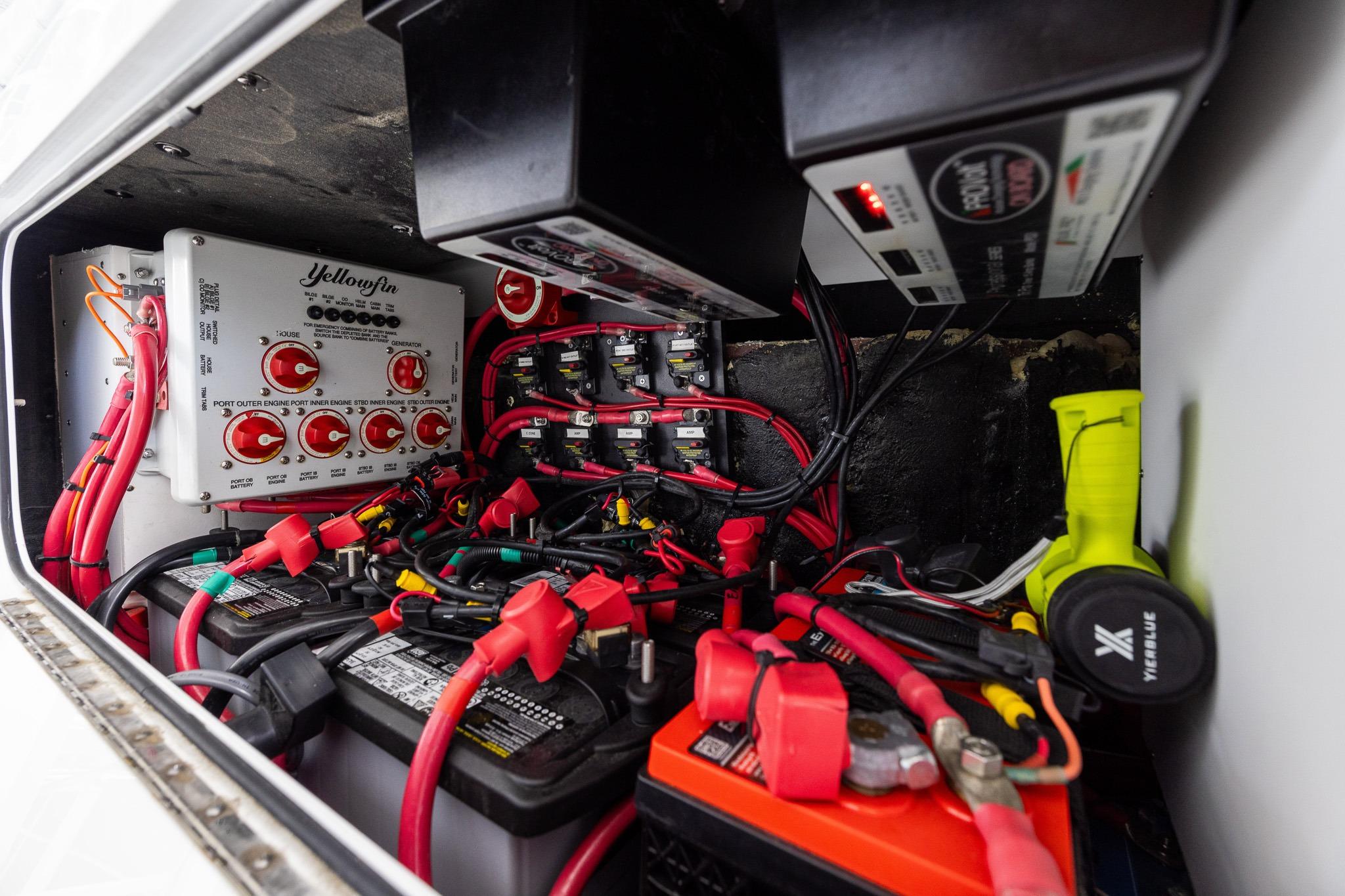 Electrical system of 2023 Yellowfin 39 Offshore boat, featuring batteries and wiring components.