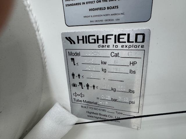 Highfield Ultralite 240SS 2025 model specifications plate with capacity and material details.