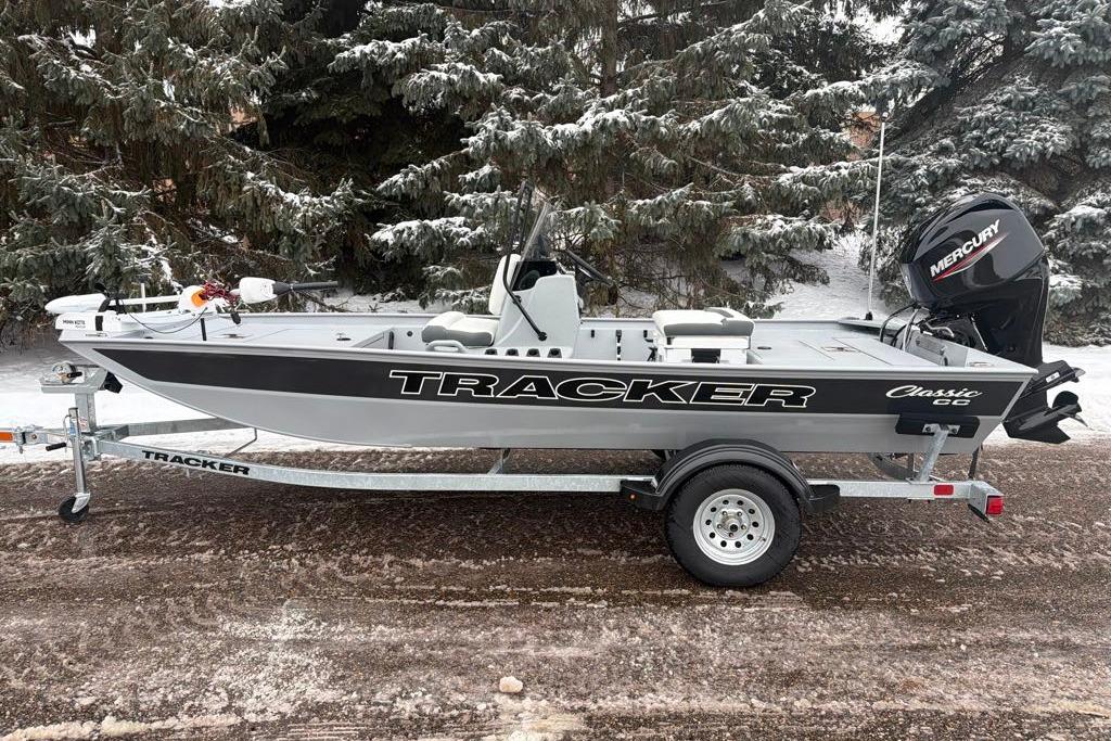 2026 Tracker Bass Tracker Classic CC boat on trailer, snowy background.