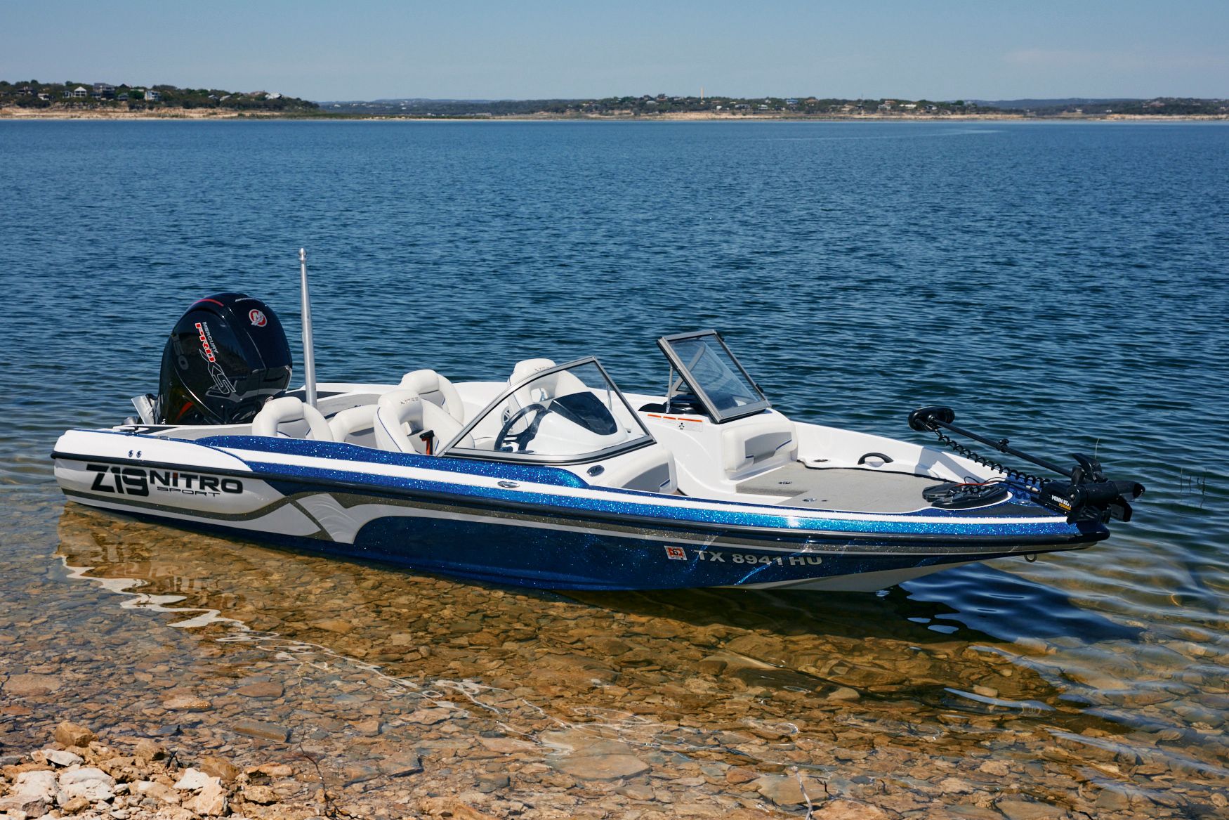 2020 Nitro Z19 Sport boat at lakeside.