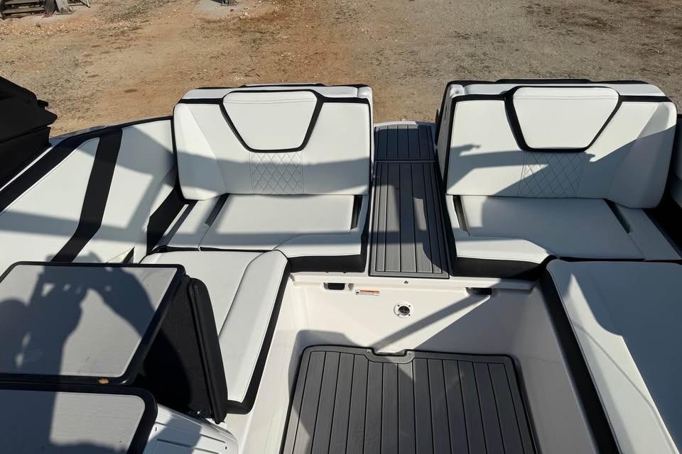 2026 Yamaha Boats 252S interior with sleek white seating and modern design.