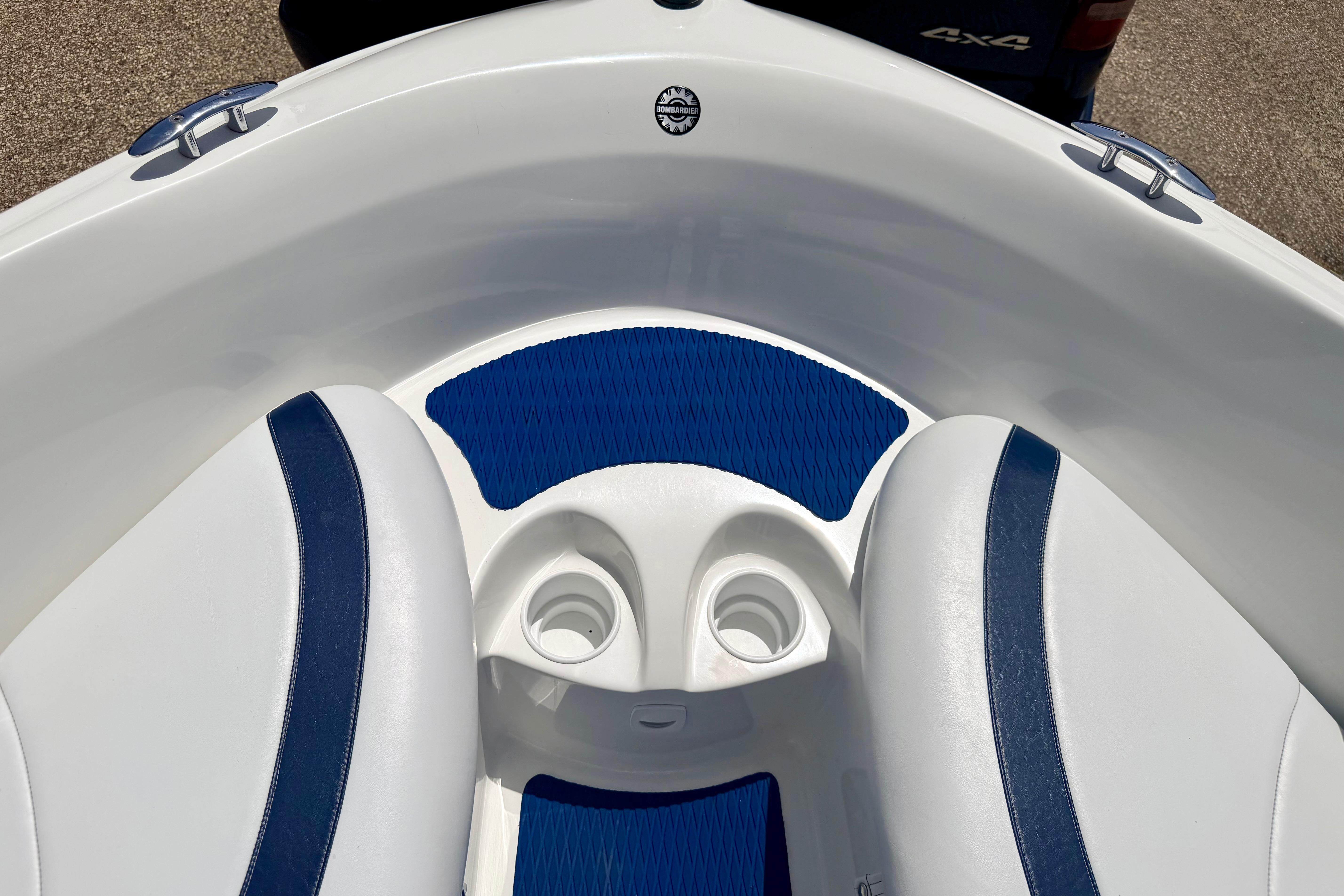 2004 Bombardier SEADOO Utopia 185 boat interior with blue and white seating.