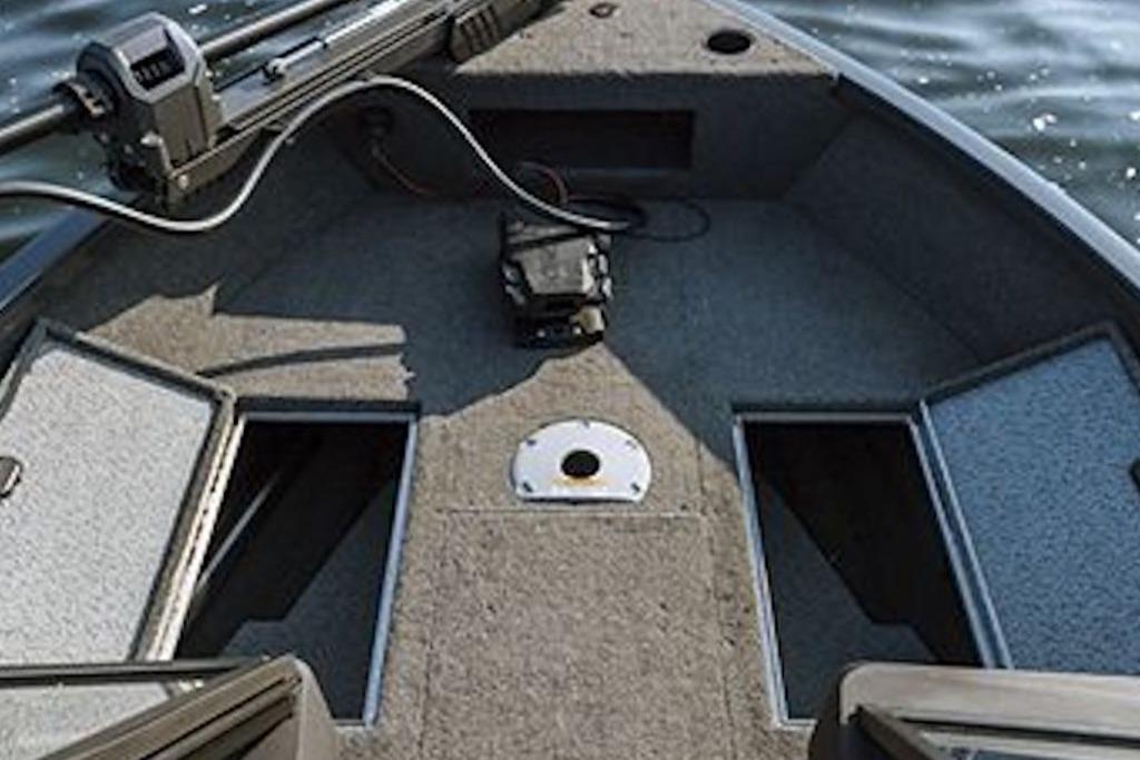 2026 Crestliner 1650 Hawk WT boat interior with storage compartments and fishing equipment.