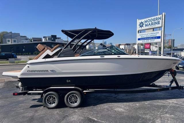2025 Chaparral 247 SSX boat on trailer at Modern Marine dealership.