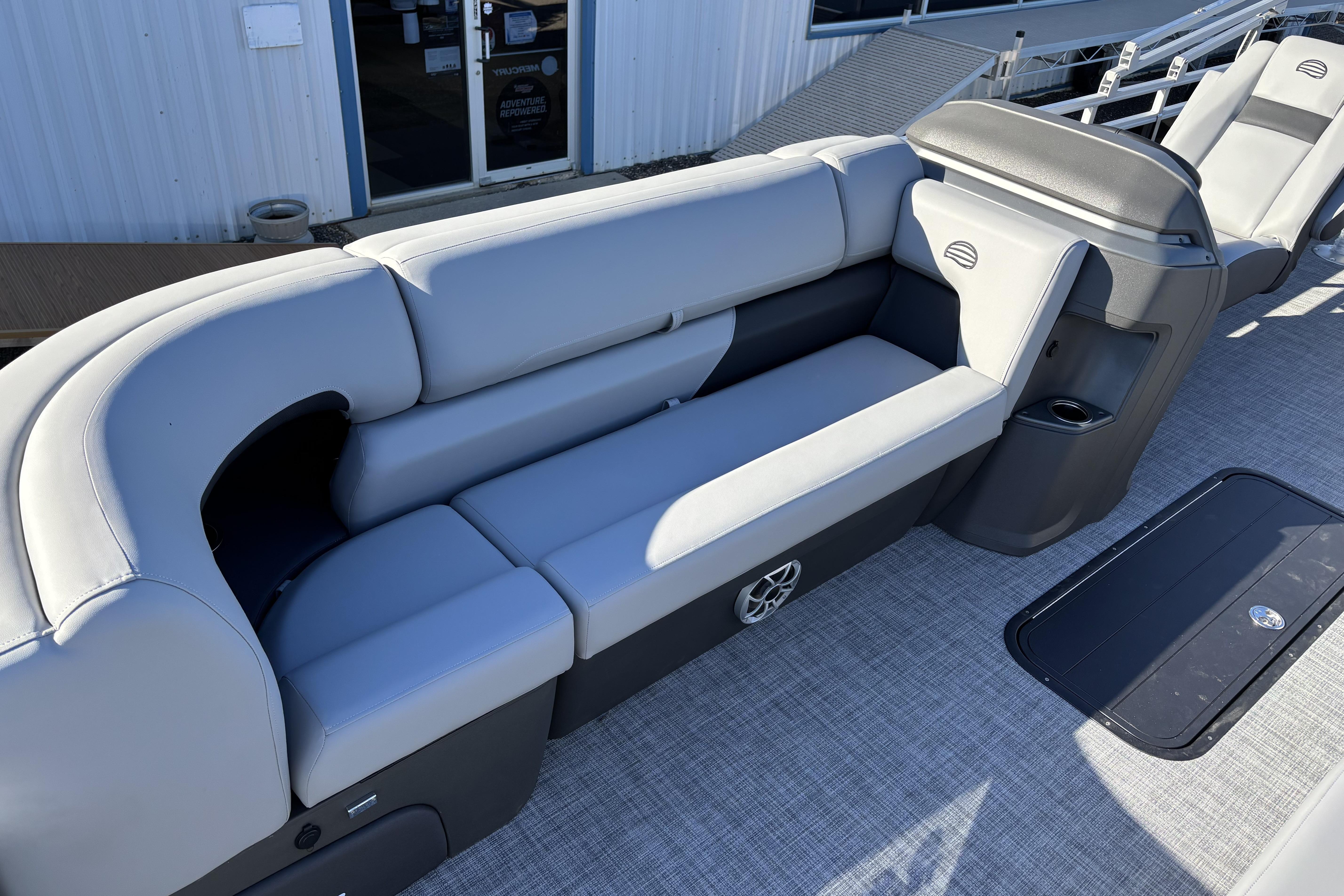 2026 Sun Tracker SportFish 22 XP3 boat interior with gray seating and modern design.