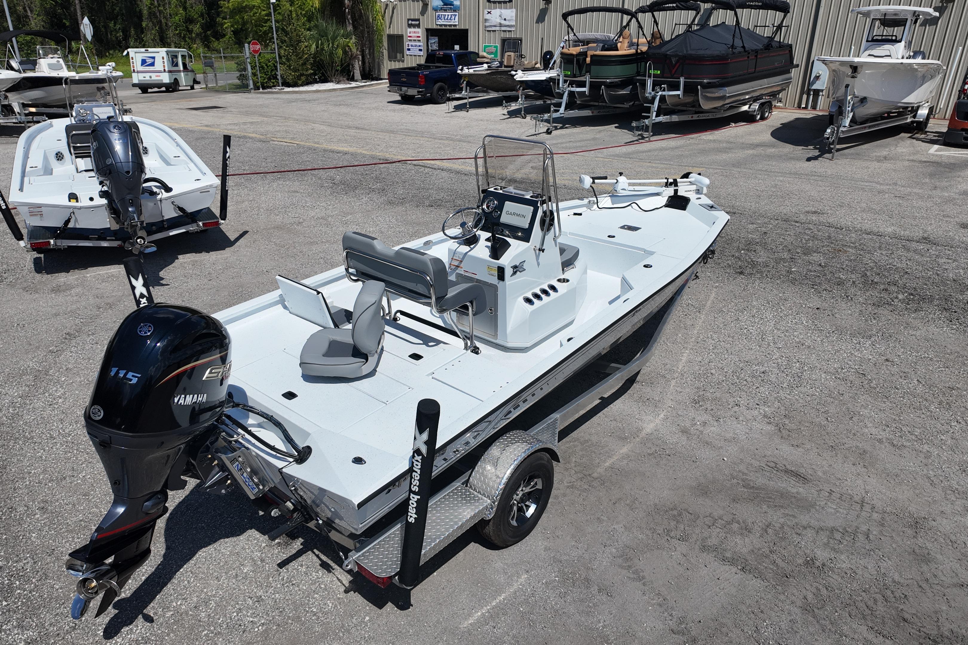 2026 Xpress H20 boat with Yamaha engine on trailer in dealership lot.