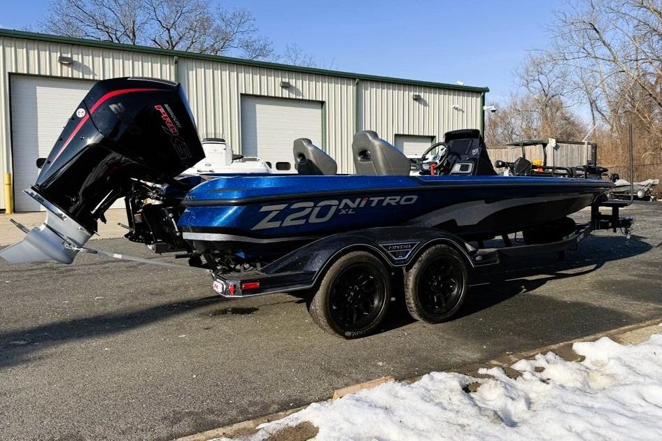 2026 Nitro Z20 XL Pro boat with powerful engine, parked outdoors on a sunny day.