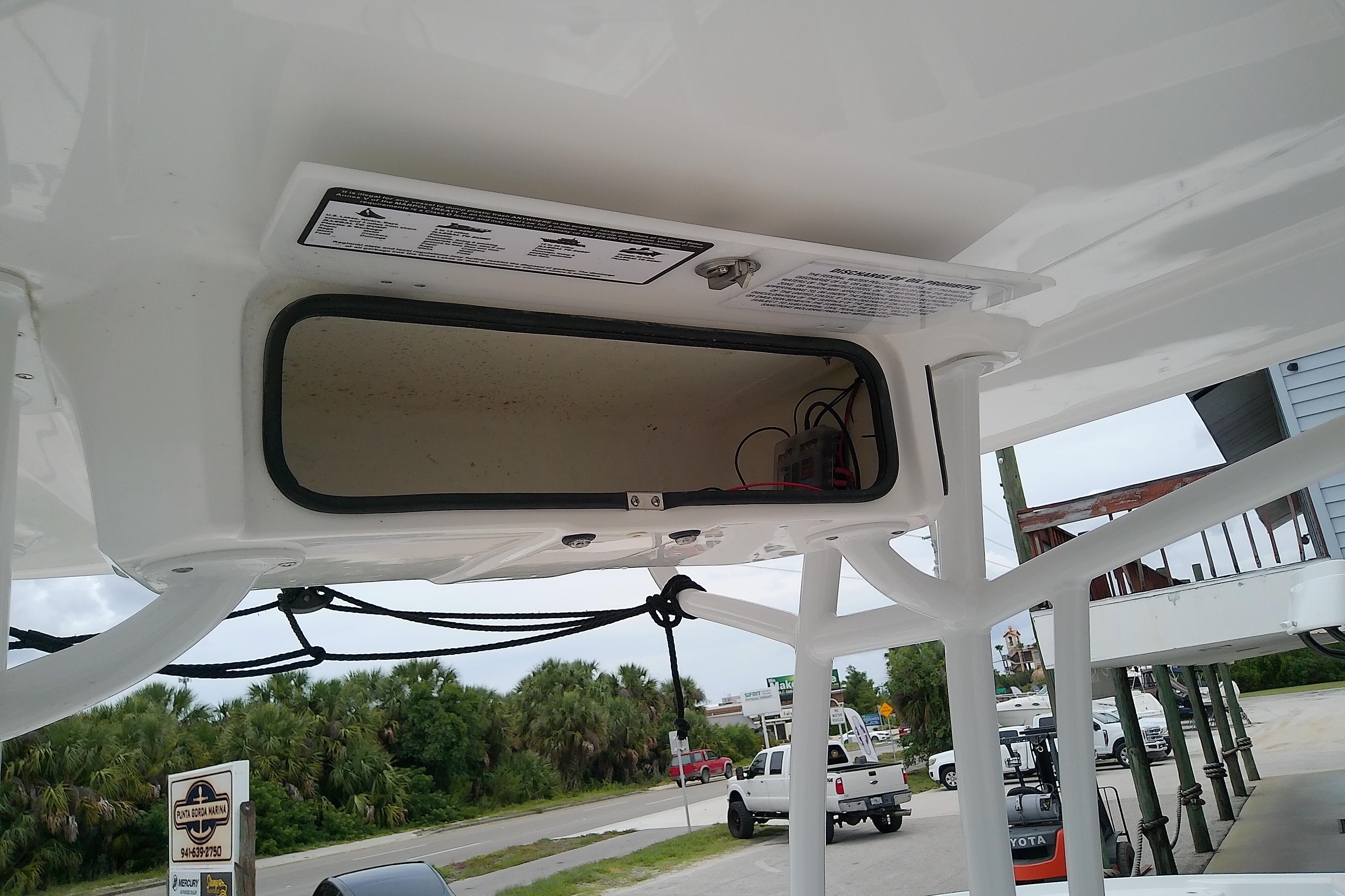2025 Glasstream 240 CCX boat interior storage compartment with wiring, viewed from below.