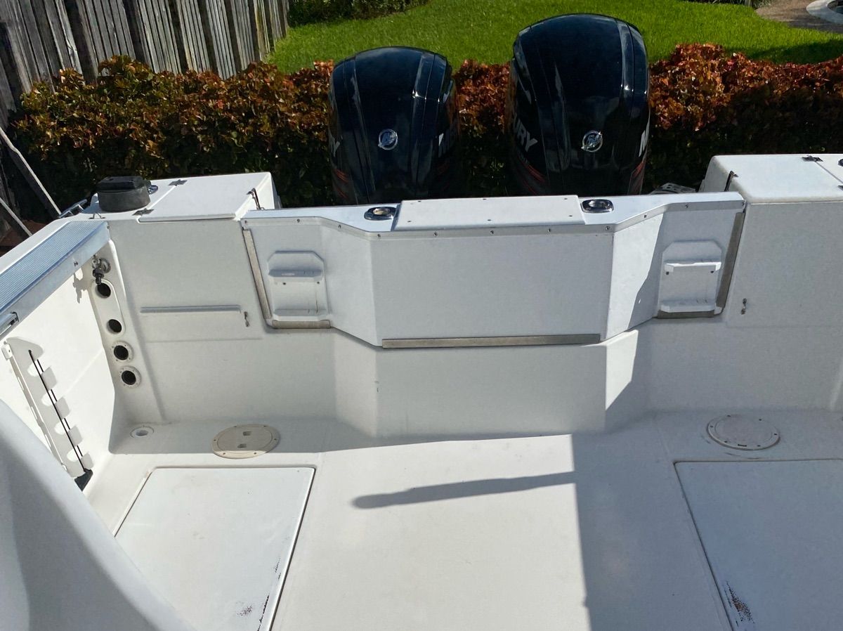 Interior of a 1990 Bayliner 2302 Trophy boat with dual engines.