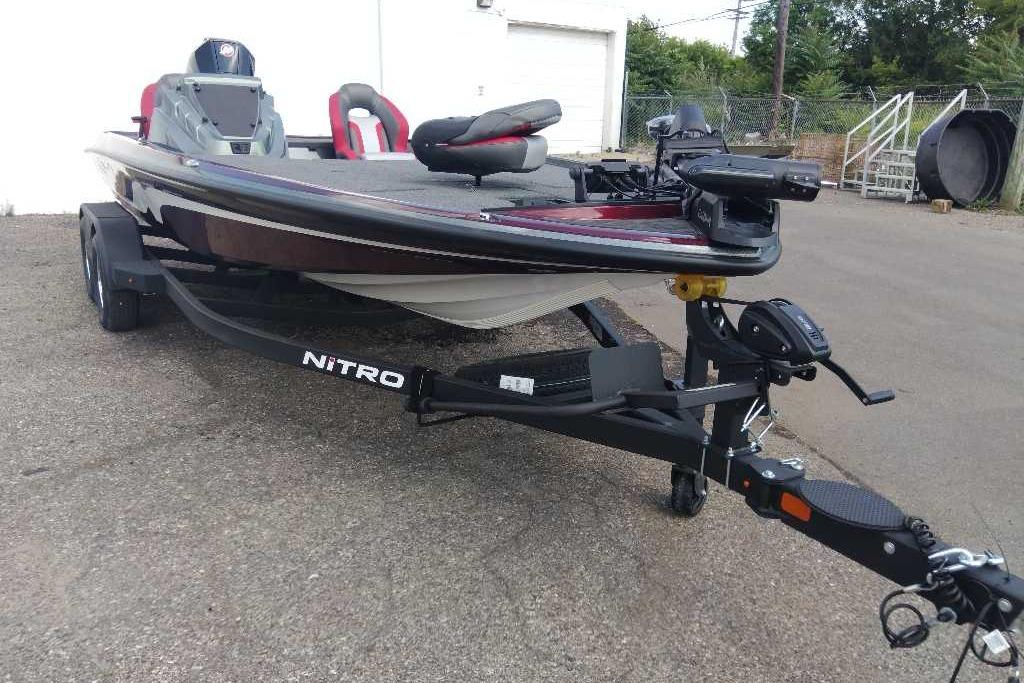 2026 Nitro Z20 XL Pro fishing boat on trailer, parked outdoors.