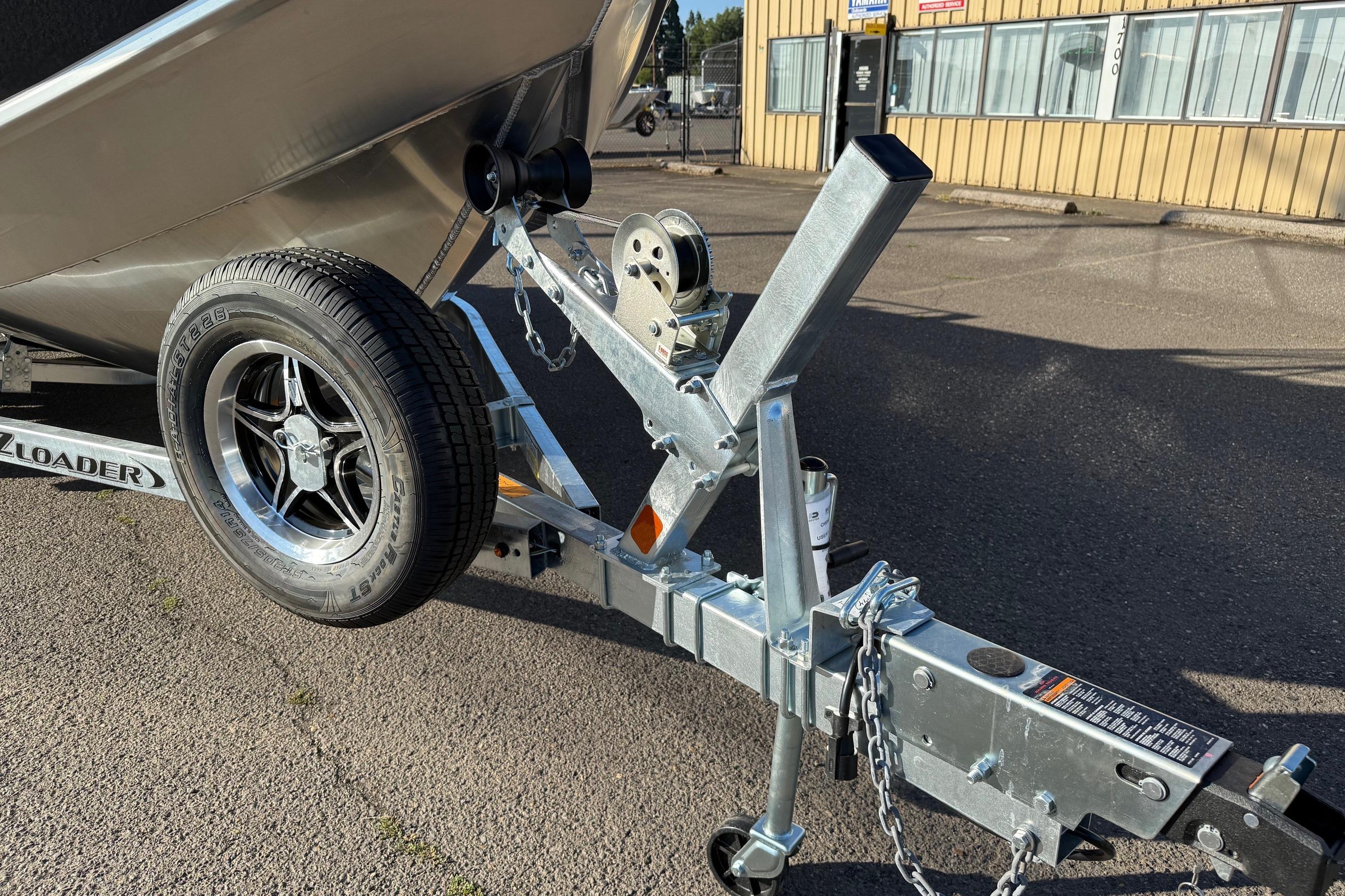 Trailer hitch of 2026 Thunder Jet 200 Luxor boat, featuring sturdy construction and durable wheel.