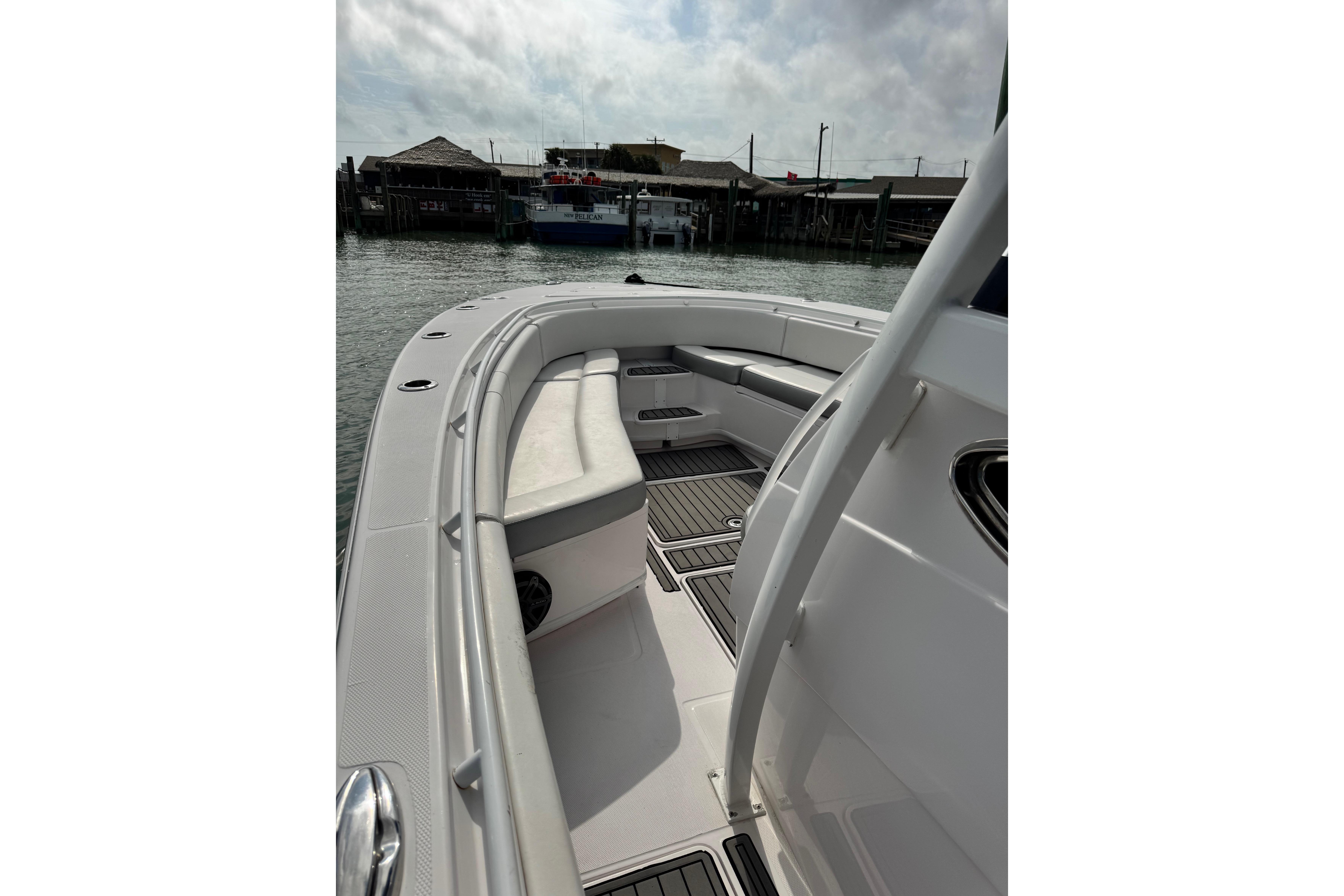 2018 Fountain 34 Center Console boat interior with seating and deck view.