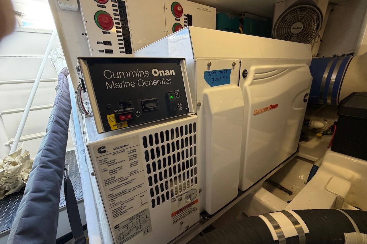 Cummins Onan marine generator in 2012 Viking 50 Convertible engine room.