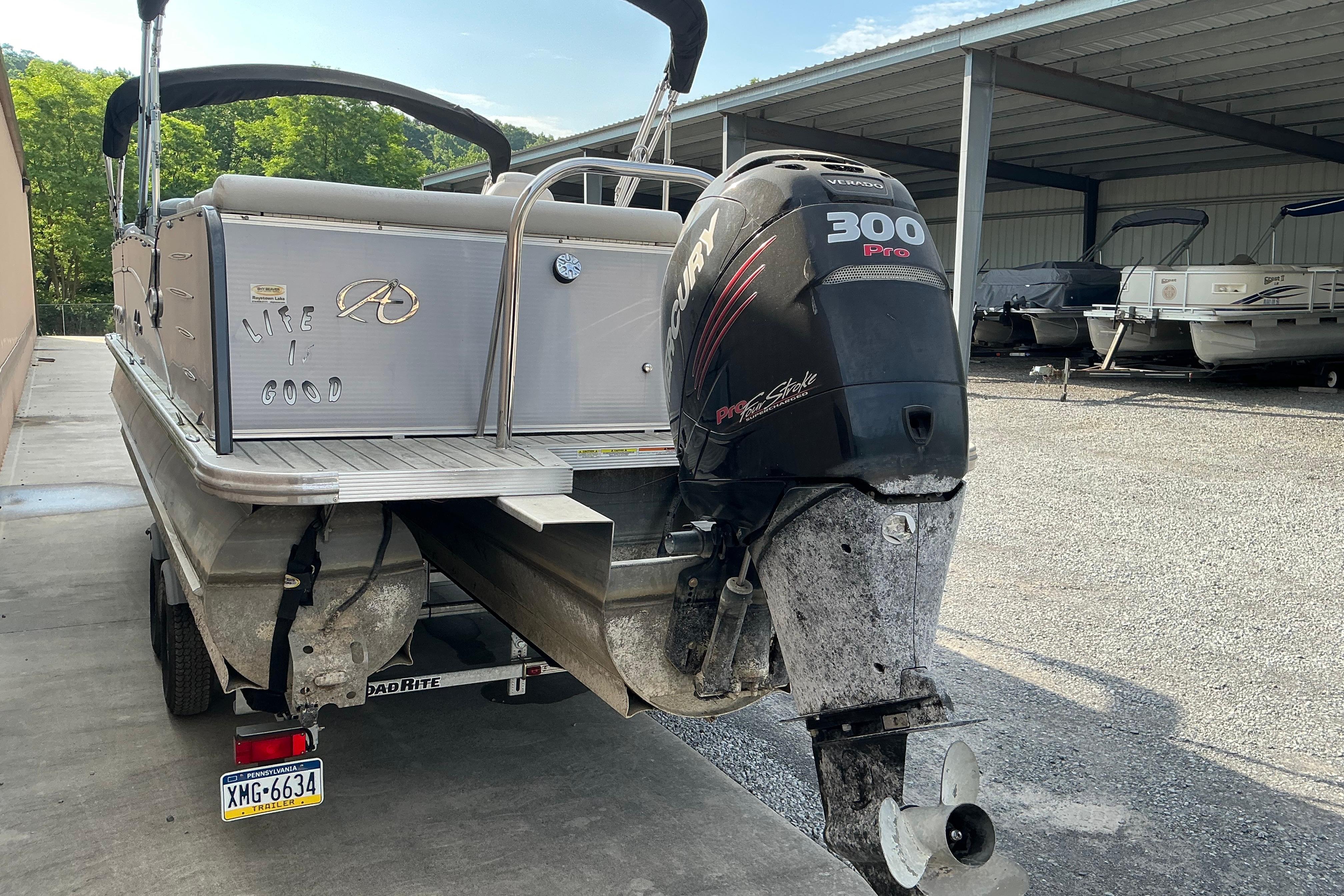2014 Avalon 25 ft. Paradise Elite pontoon boat with Mercury 300 Pro motor.