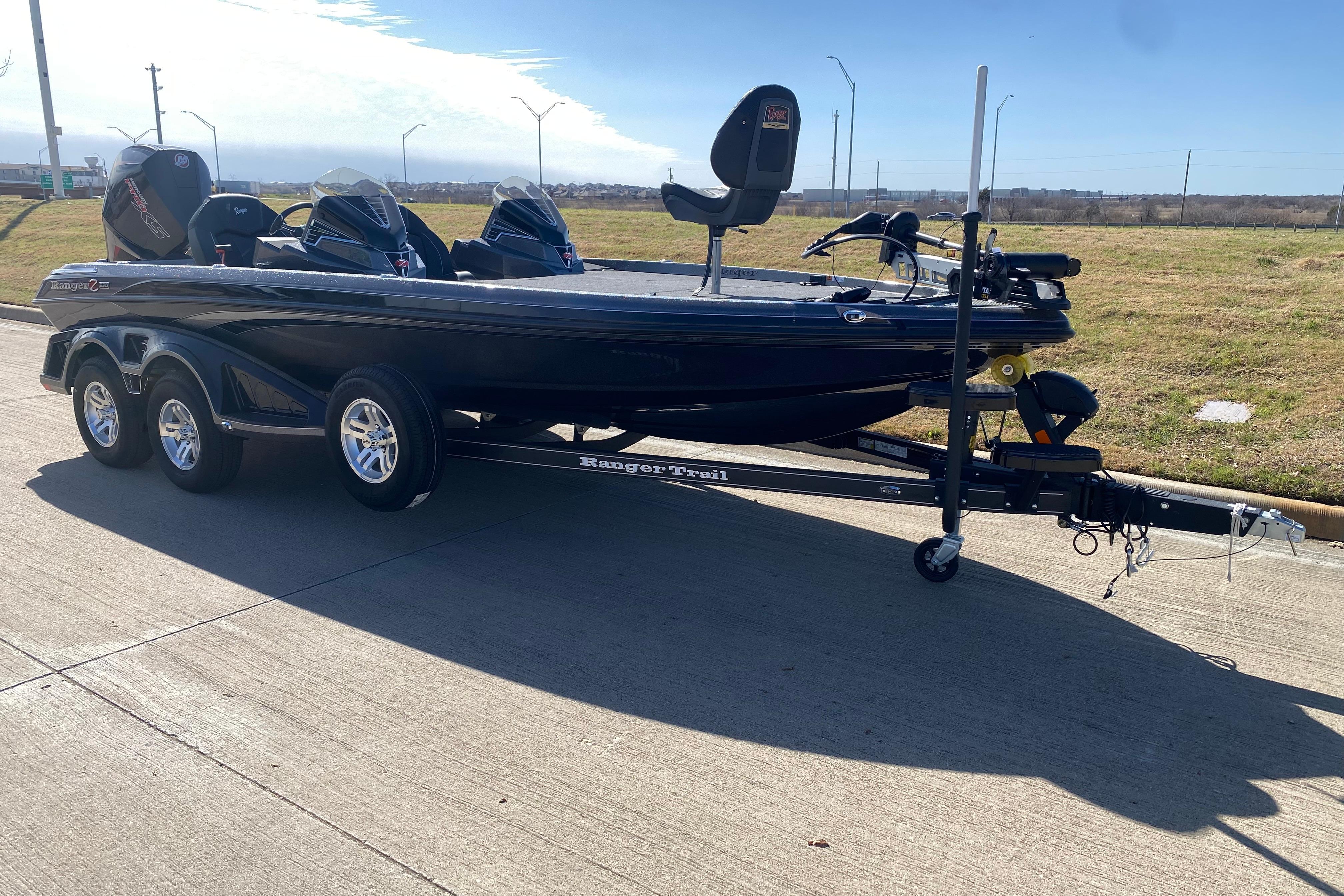 2025 Ranger Z520 boat on trailer, parked on a sunny day.