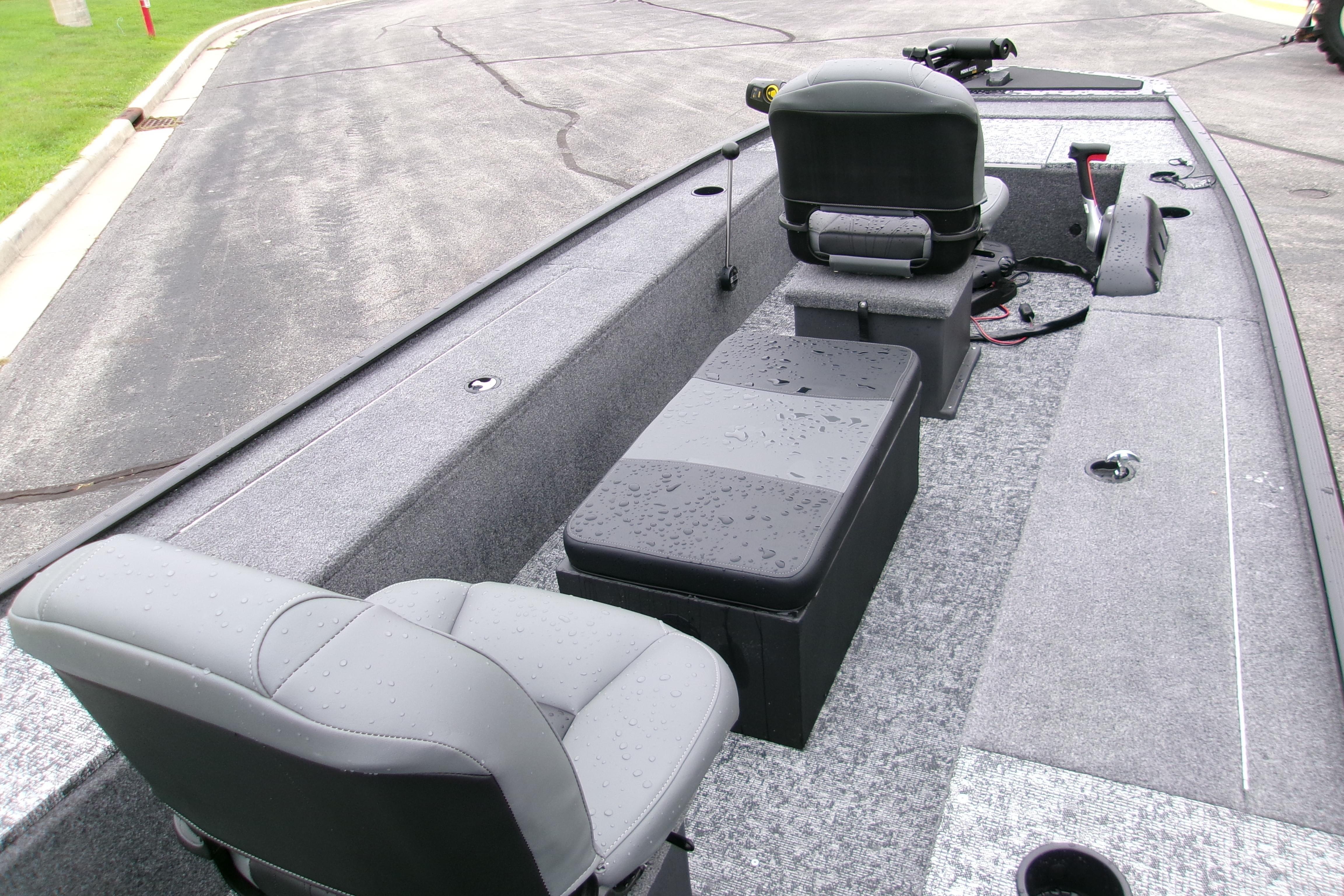 2025 Tracker Panfish 17 boat interior with gray seating and carpeted deck.