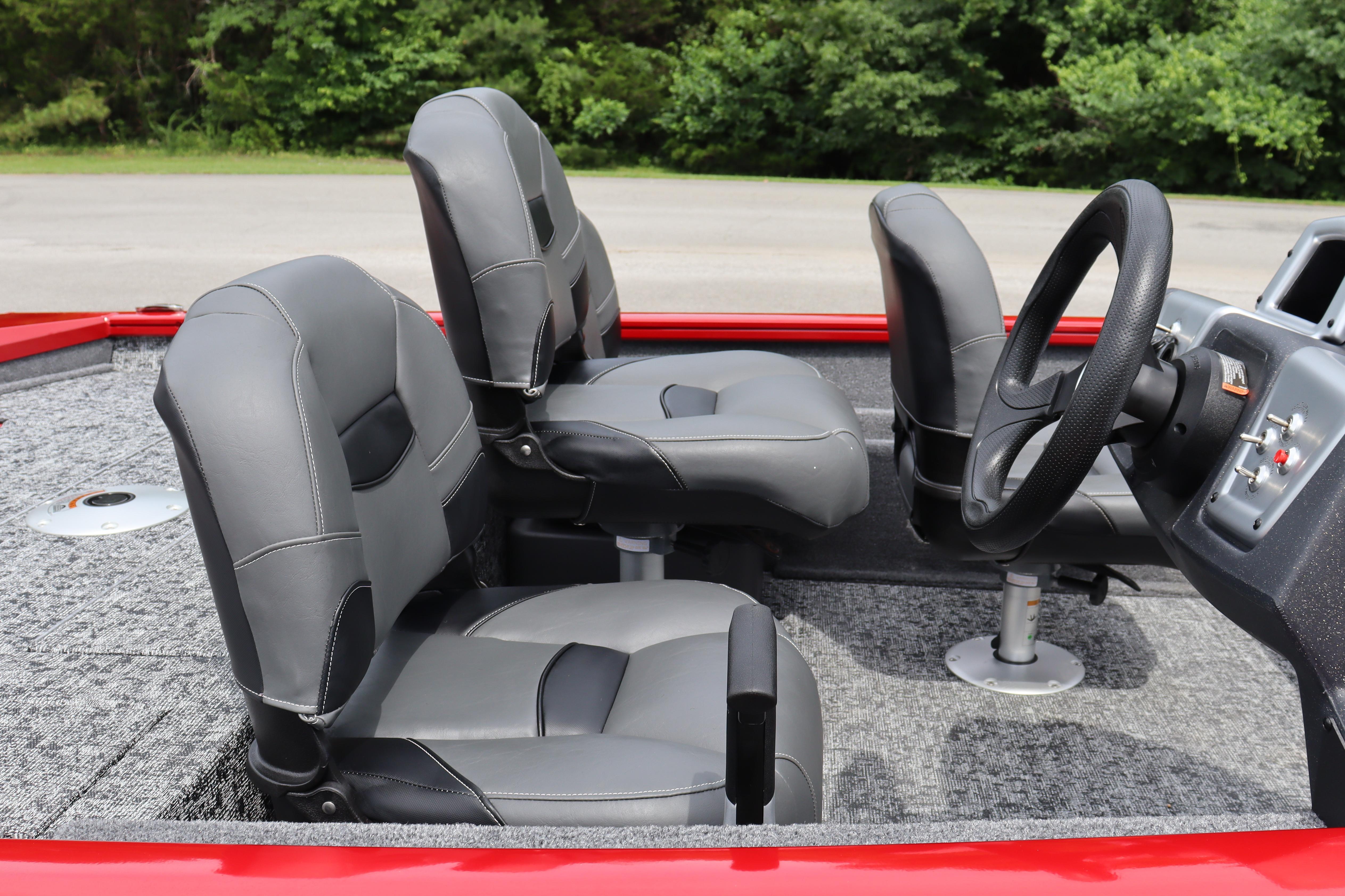 2026 Tracker Pro Team 175 Crappie Edition boat interior with gray seats and steering wheel.