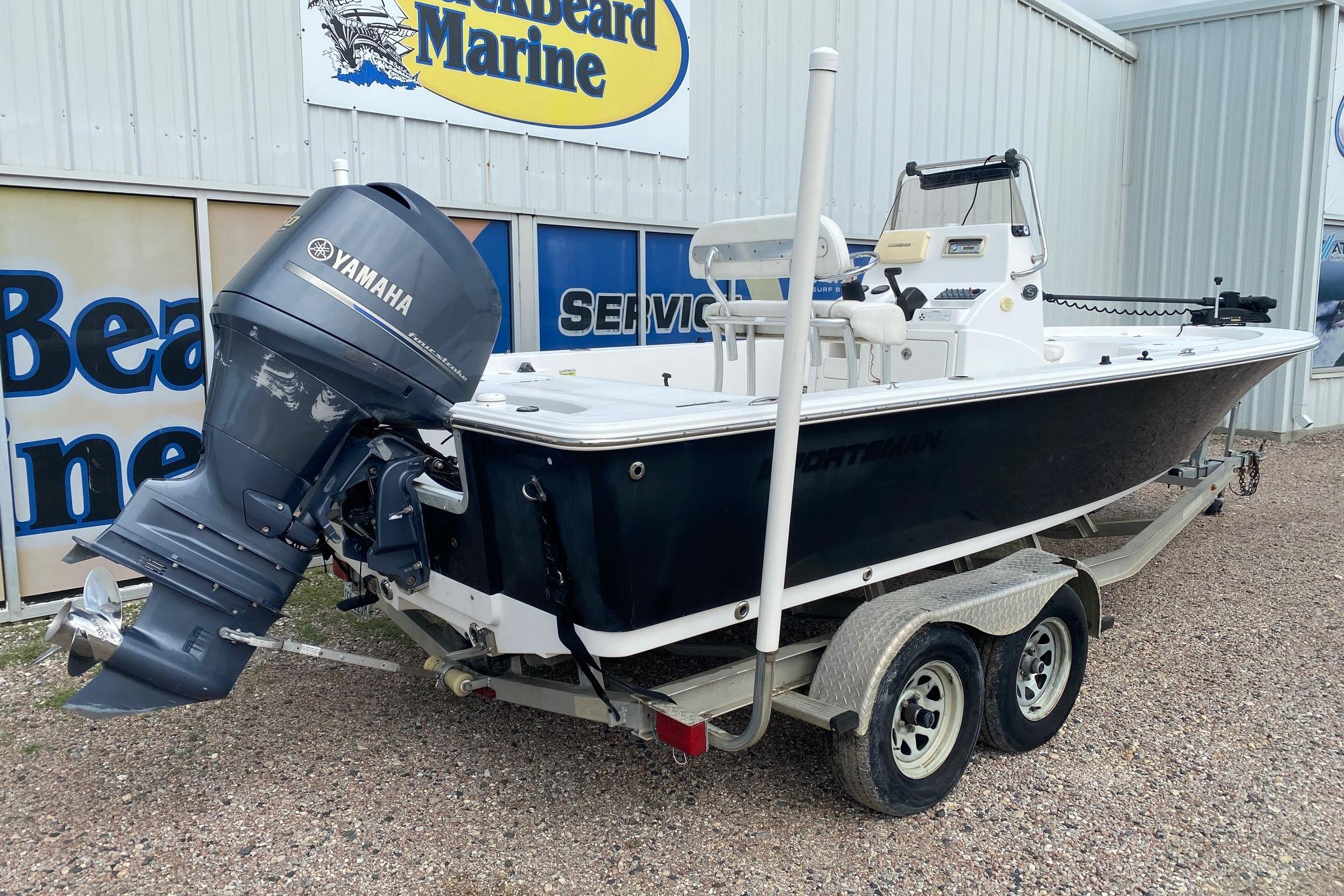 2013 Sportsman Masters 227 Bay Boat with Yamaha engine on trailer.