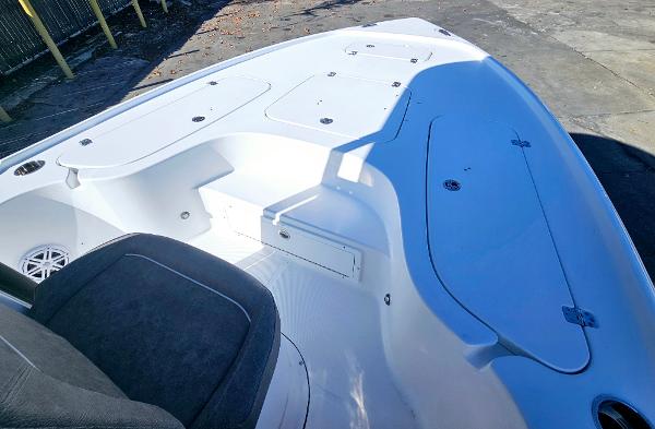 2026 Sea Hunt BX 22 BR boat interior, featuring spacious seating and storage compartments.