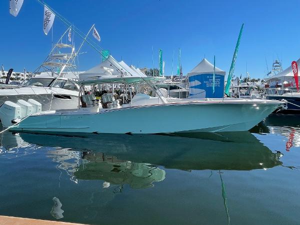 2025 Mag Bay 43 Center Console boat docked at a marina.