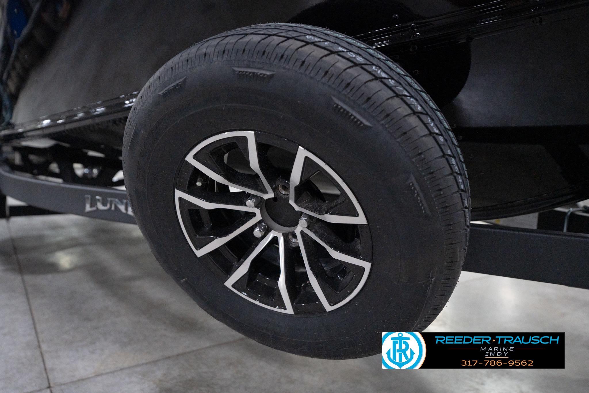 2026 Lund 1800 Explorer Sport trailer wheel, black and silver design, Reeder-Trausch Marine logo.
