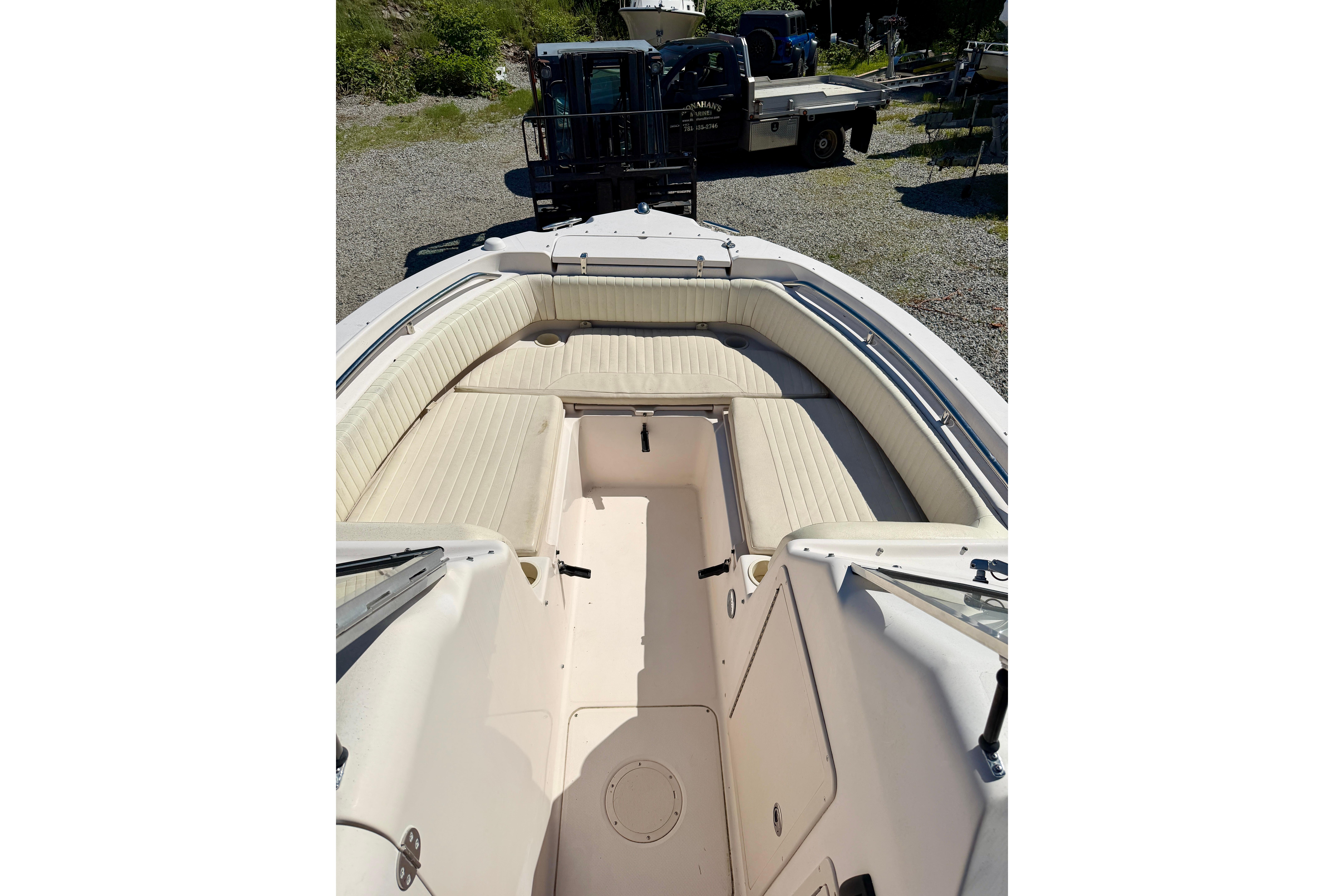 2005 Grady-White Freedom 225 boat interior with spacious seating and storage.