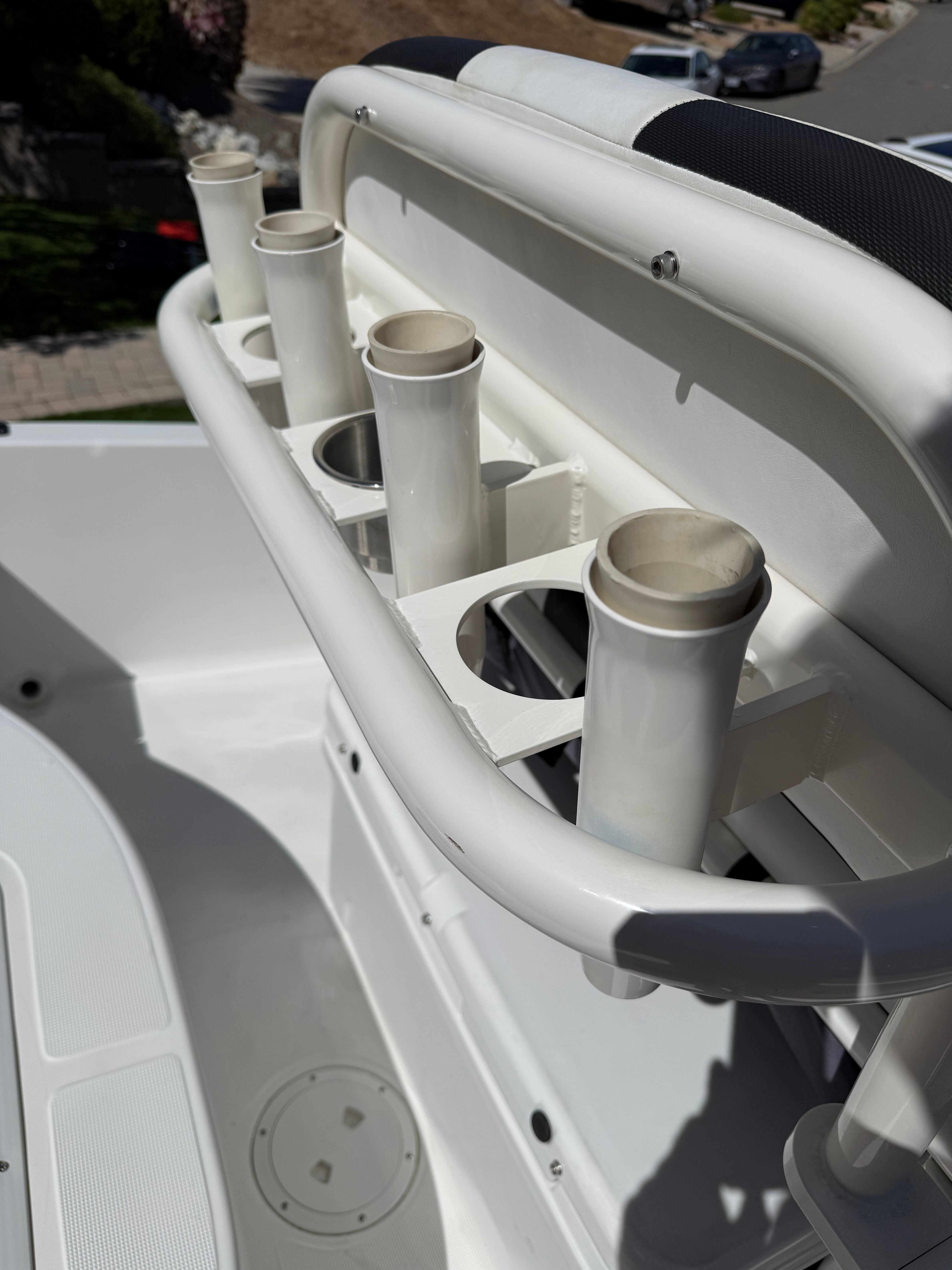 1998 Robalo 2100 Bay Hunter with fishing rod holders.