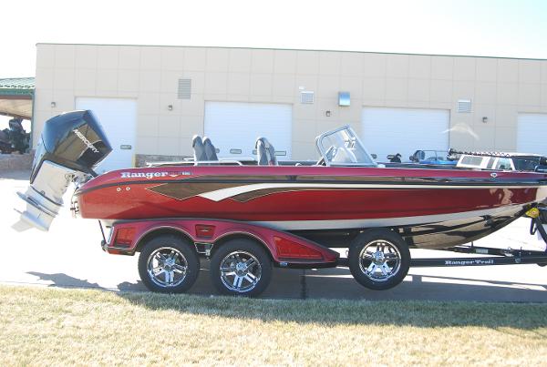 2024 Ranger 620FS Pro boat on a trailer, red and black color scheme.