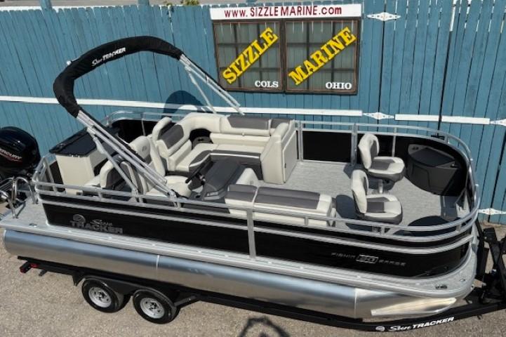 2026 Sun Tracker Fishin' Barge 20 DLX pontoon boat at Sizzle Marine dealership.