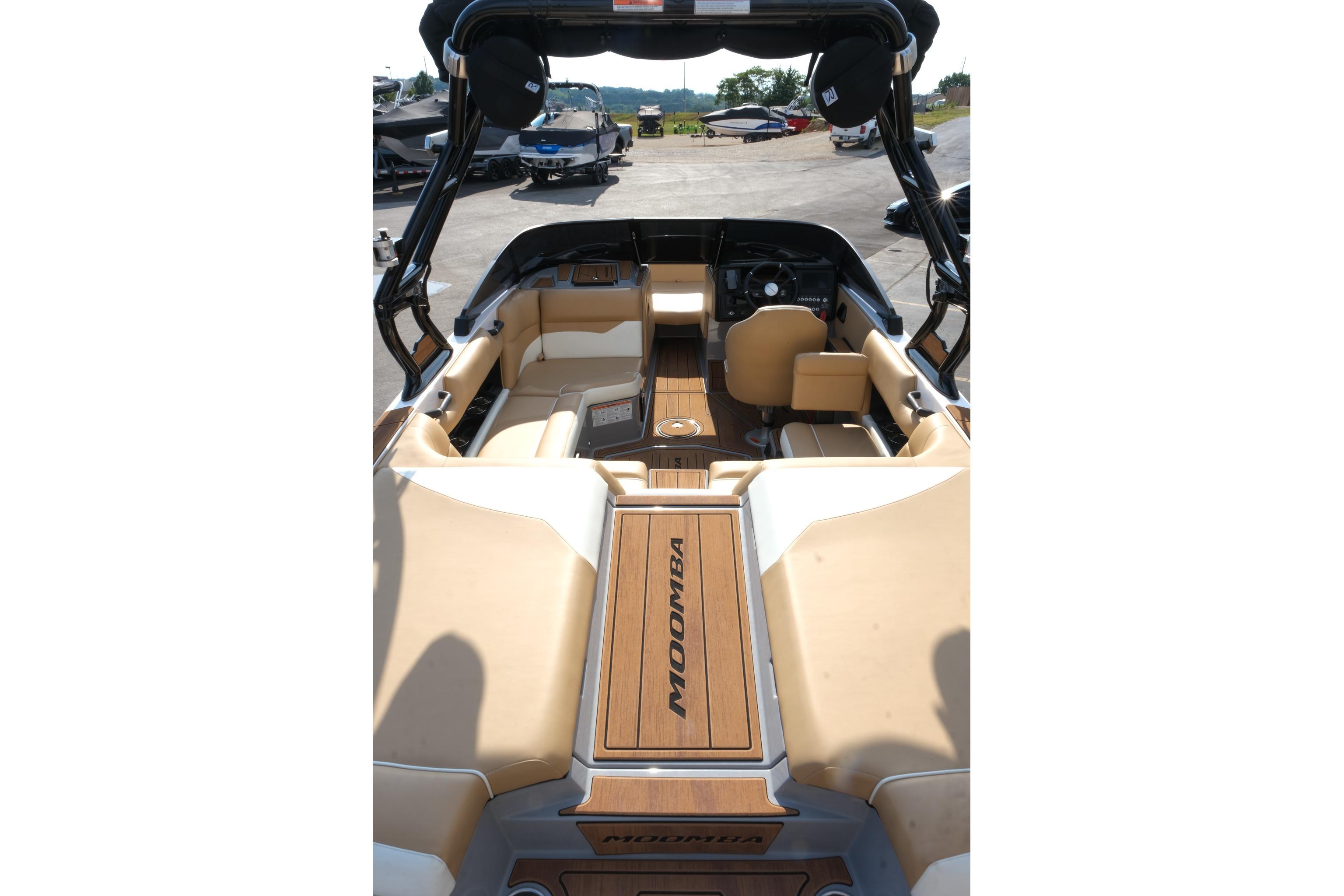 2023 Moomba Mondo boat interior with tan seating and sleek design.
