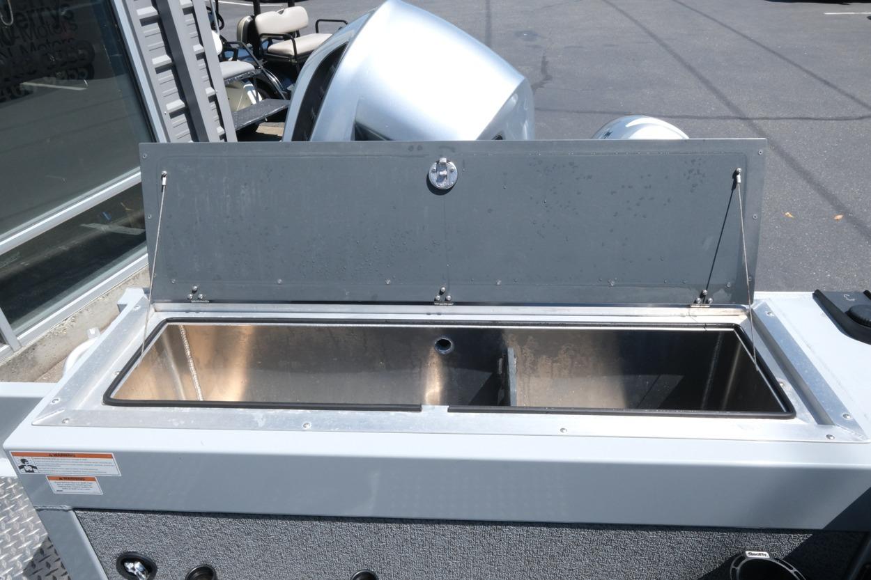 Open storage compartment on a 2018 Hewescraft 220 Ocean Pro ET Hardtop boat.