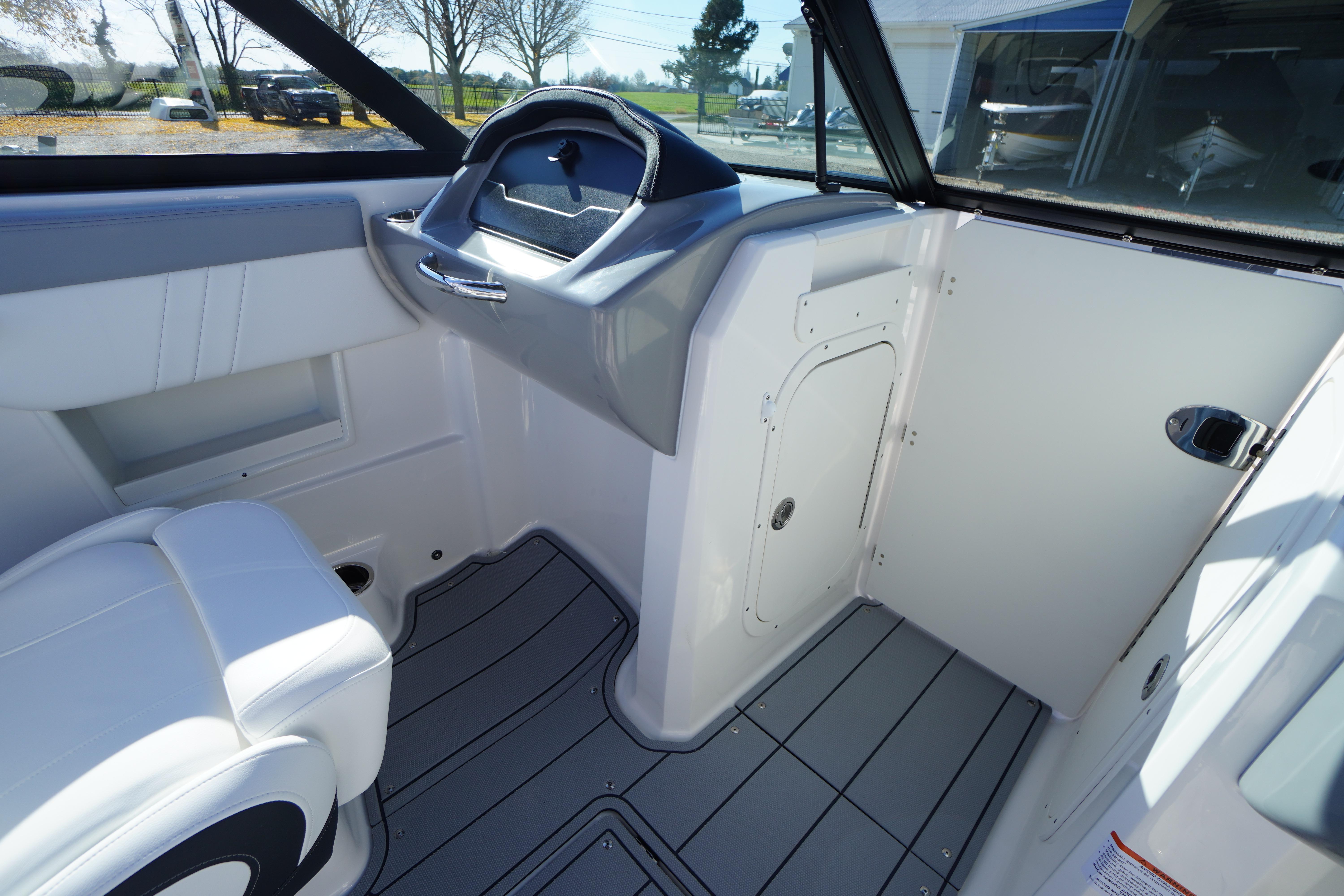 2026 Chaparral 23 SSi OB boat interior with sleek design and modern dashboard.