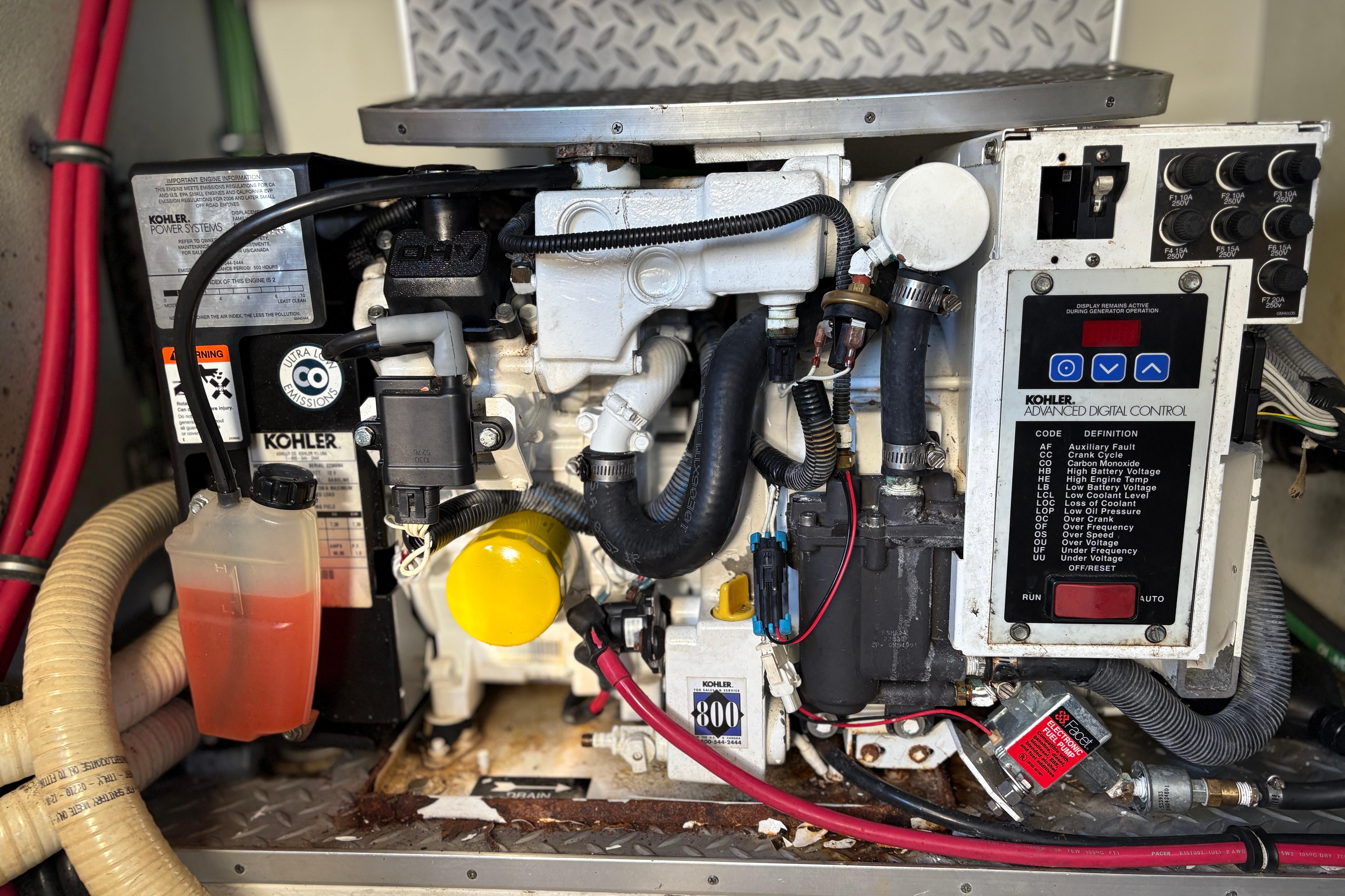 Engine compartment of a 2011 Formula 34 Performance Cruiser with Kohler power system.