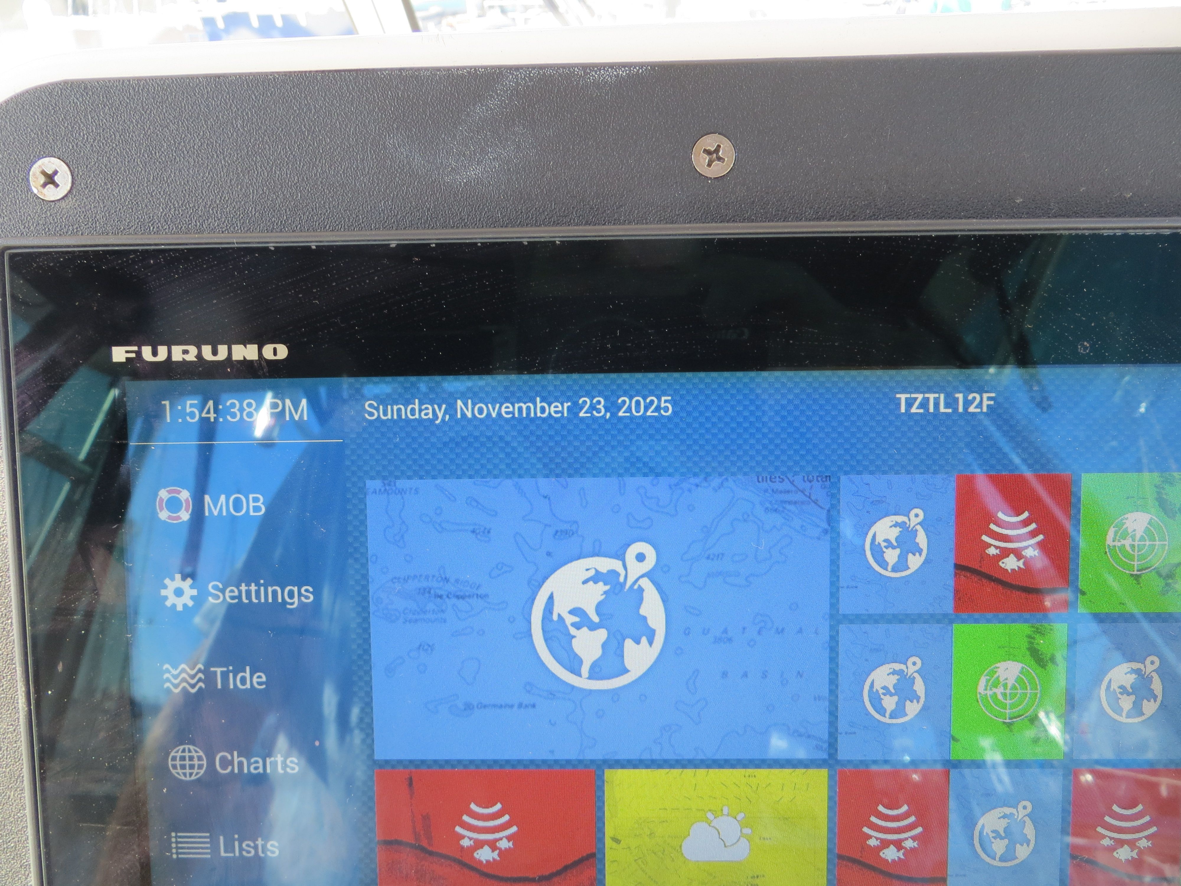 A navigation screen on a Grady-White Sailfish 282 boat displays date and time.