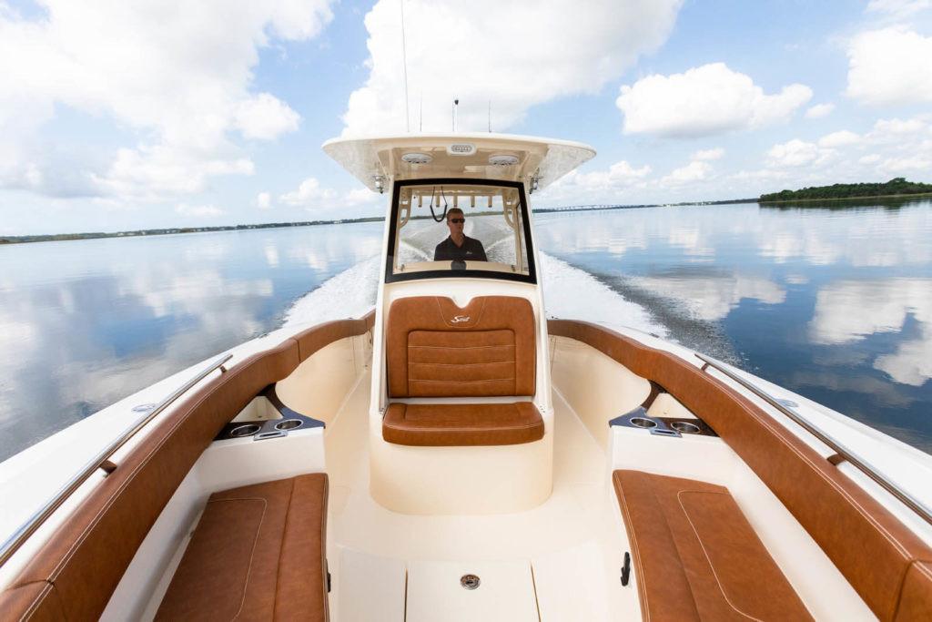 Manufacturer Provided Image: 2021 Scout 277 LXF boat cruising on calm water with clear skies.