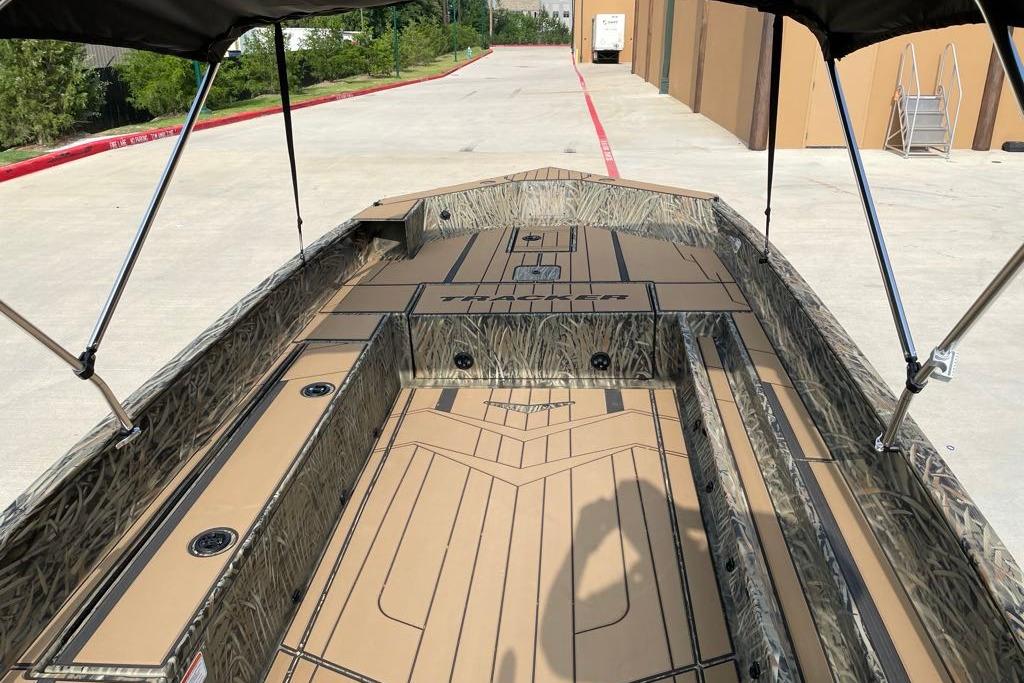 2026 Tracker Grizzly 1756 T Marsh boat with camouflage interior design.