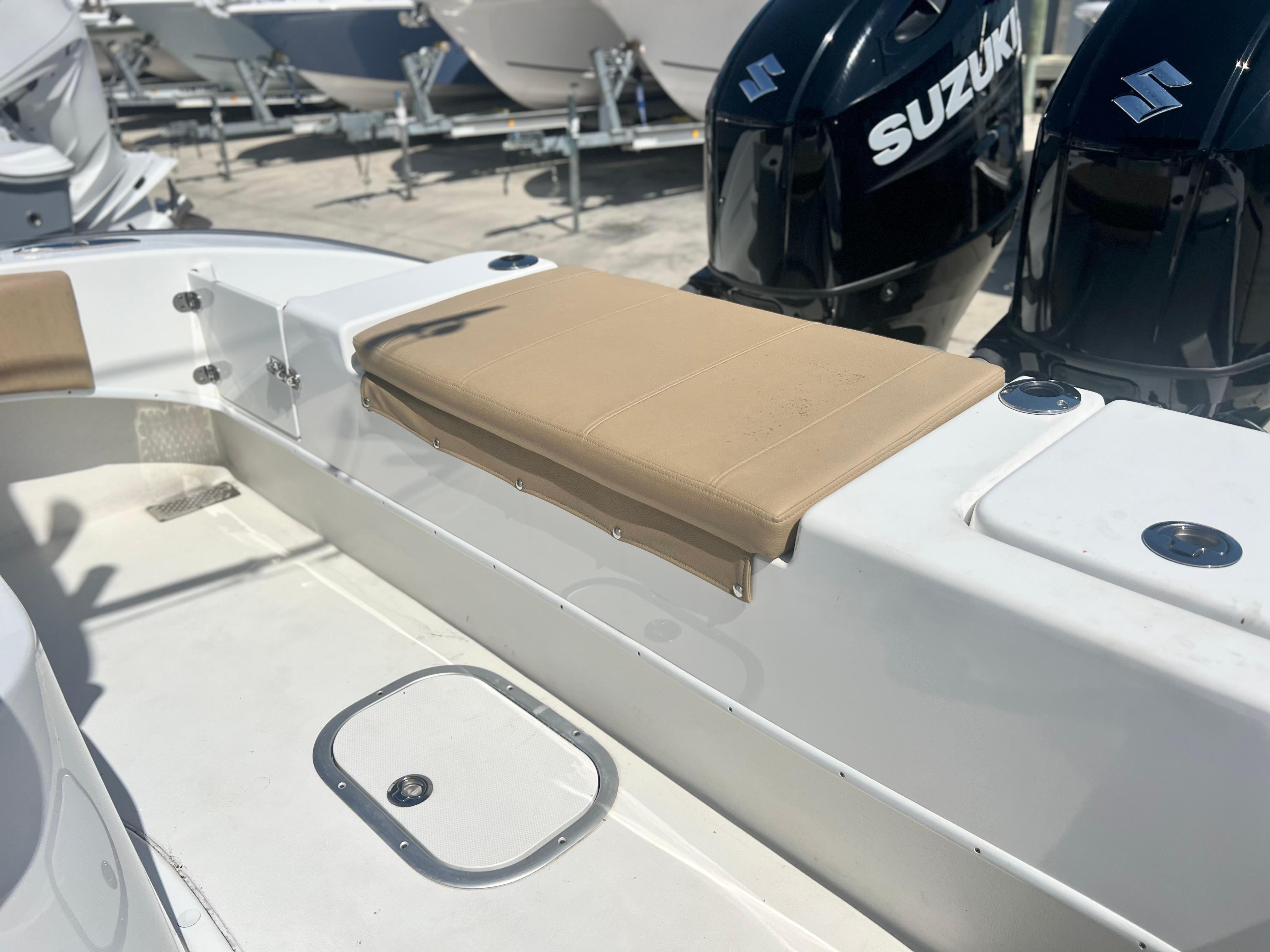 2022 Cape Horn 24 XS boat interior with seating and Suzuki engines.