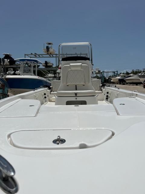 2021 Blue Wave 2200 PureBay boat on a dock.