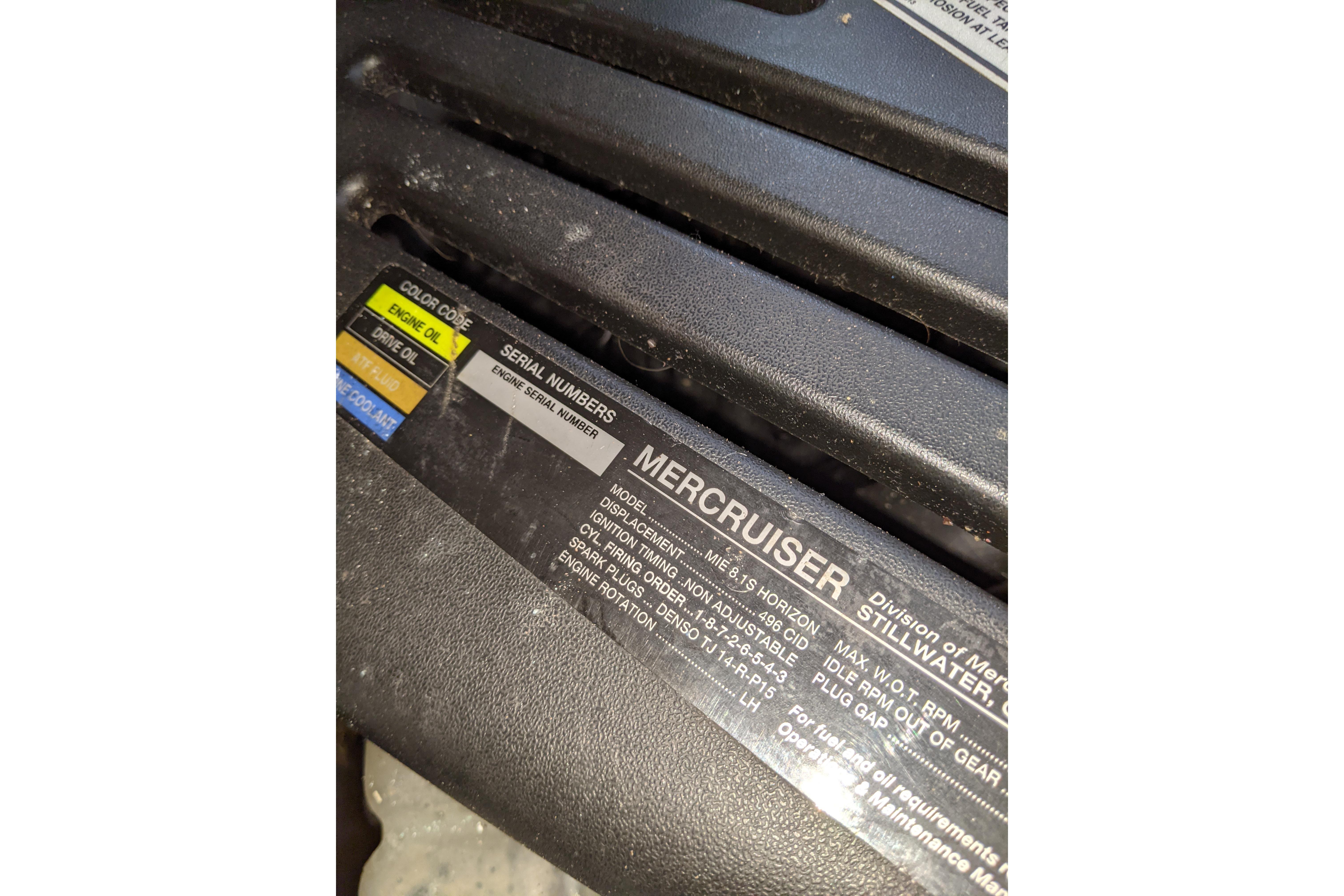 Engine label of 2004 Sea Ray 380 Sundancer, featuring MerCruiser specifications and serial numbers.