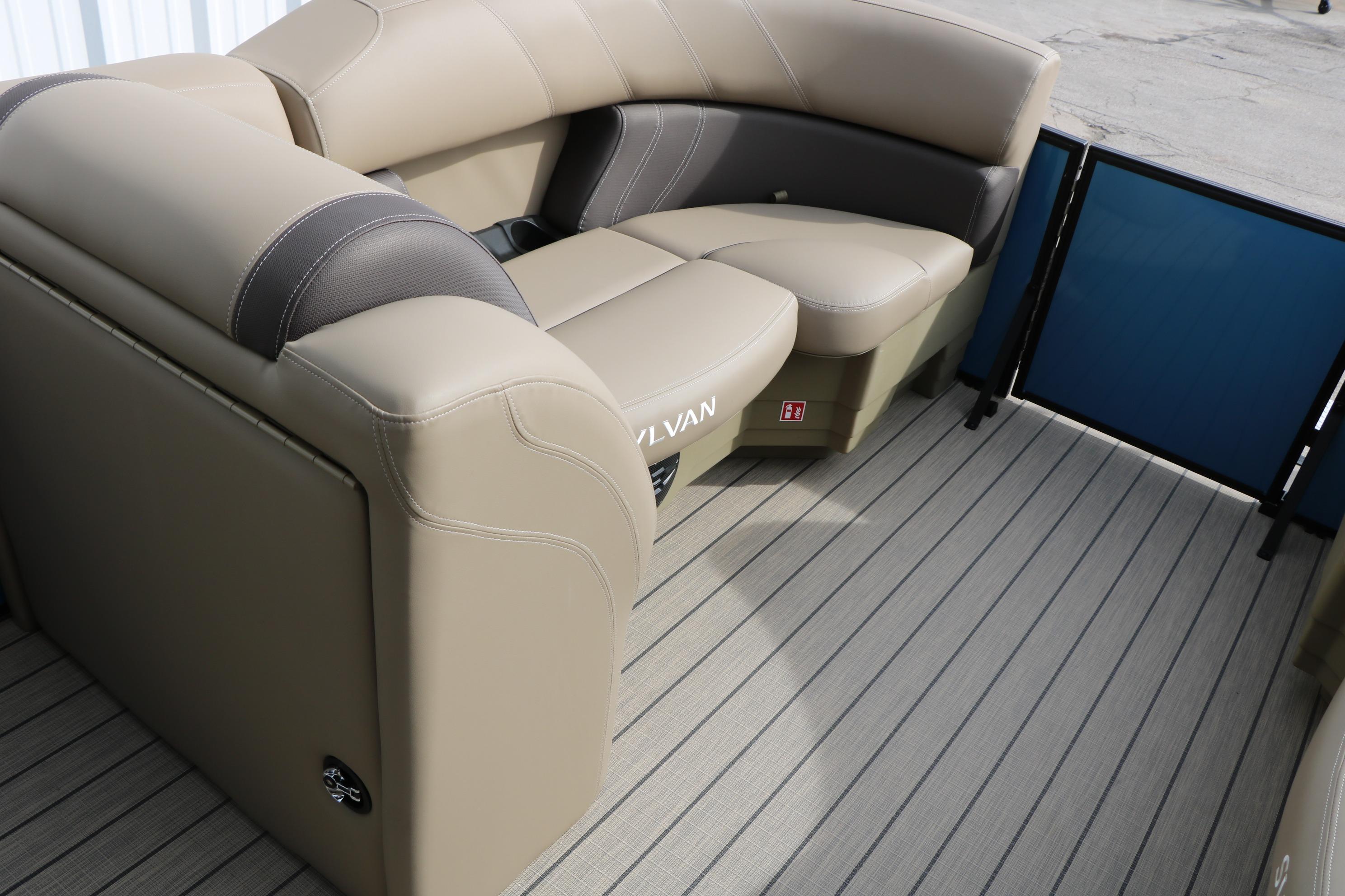 Luxurious seating on 2026 Sylvan Mirage 822 LZ pontoon boat, featuring beige upholstery.
