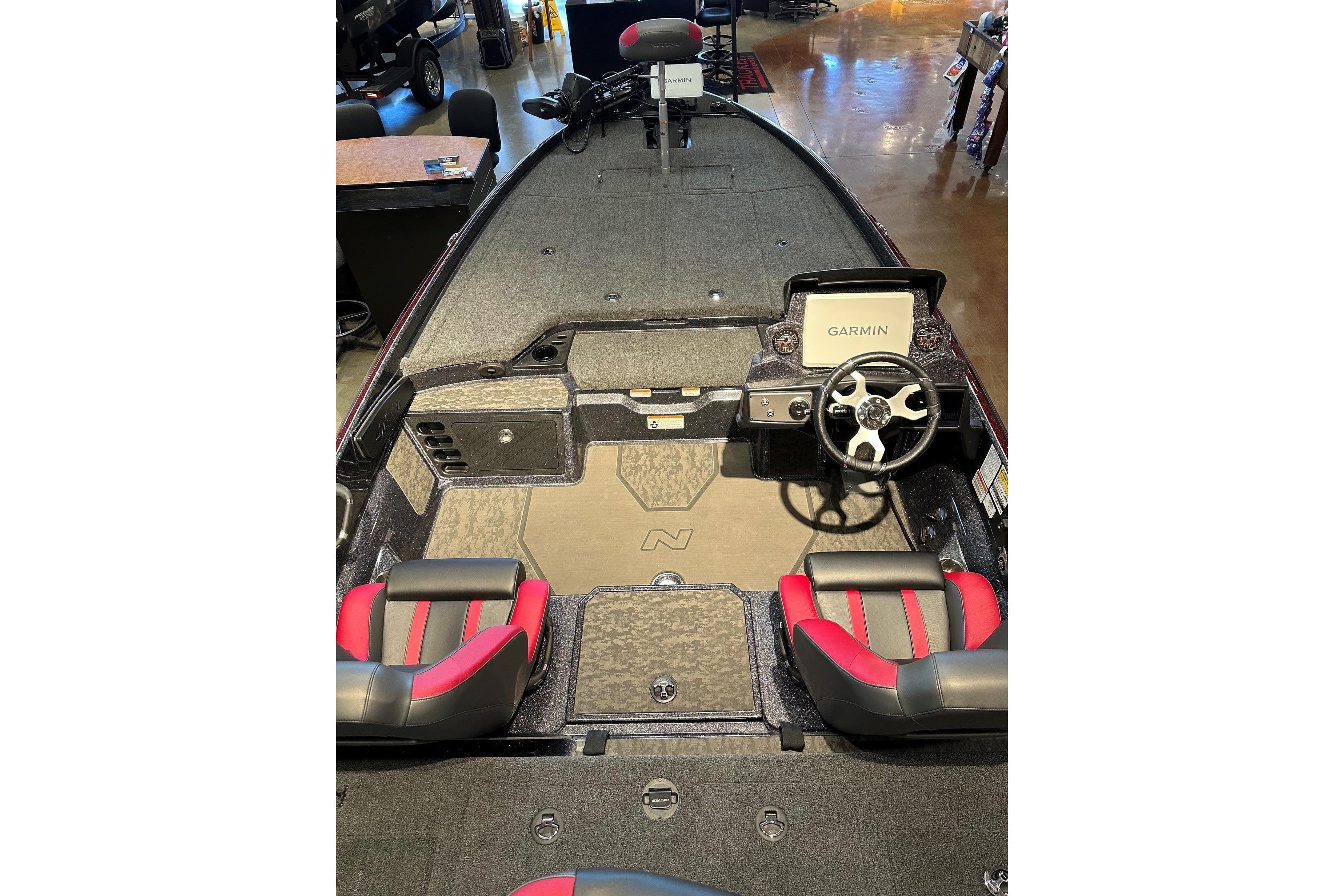 2026 Nitro Z21 XL Pro boat interior with Garmin navigation and red-accented seats.