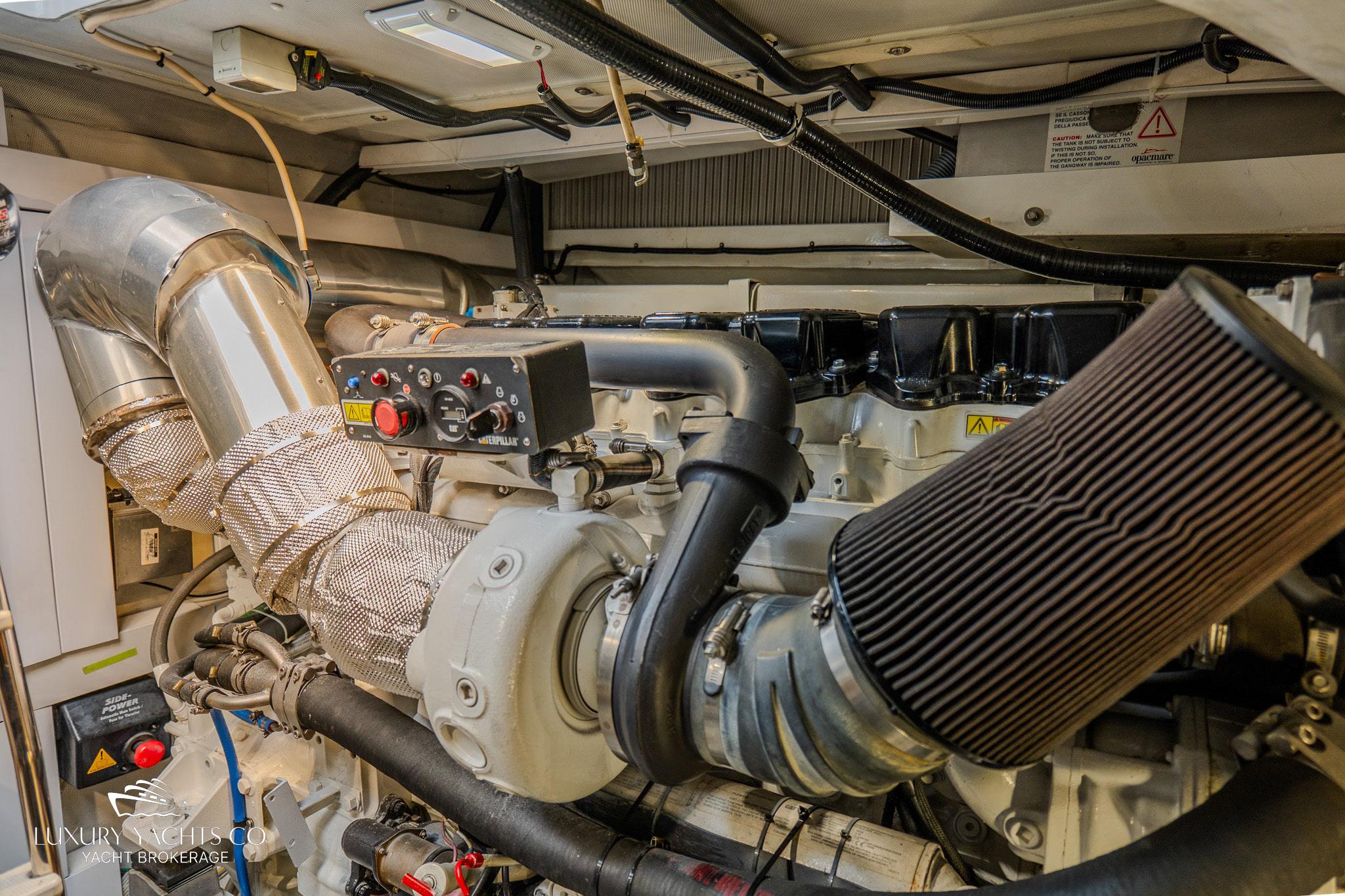 Engine room of 2010 Azimut 62S yacht, showcasing mechanical components and systems.