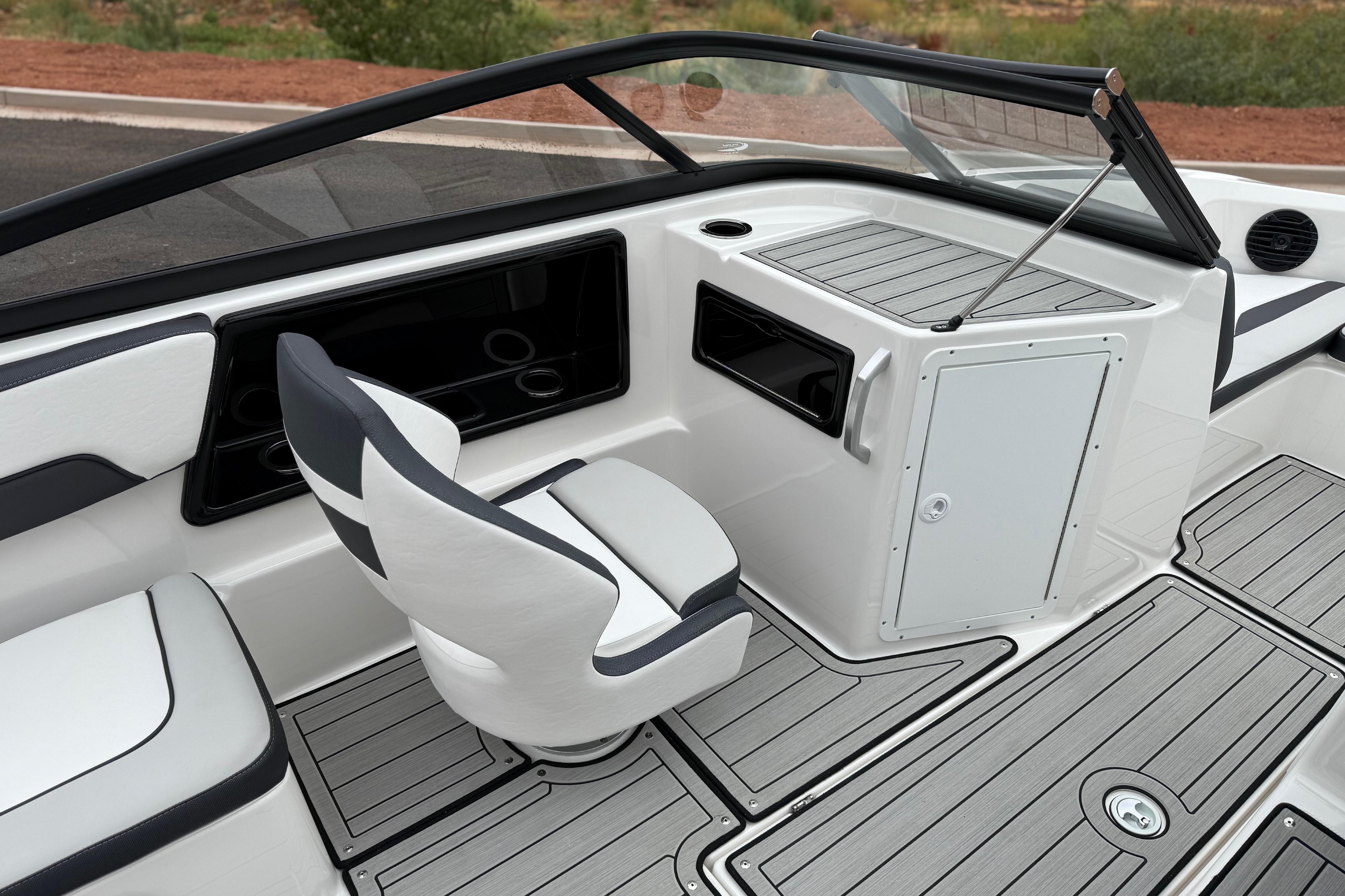 2025 Yamaha Boats 195S interior with sleek seating and modern dashboard design.