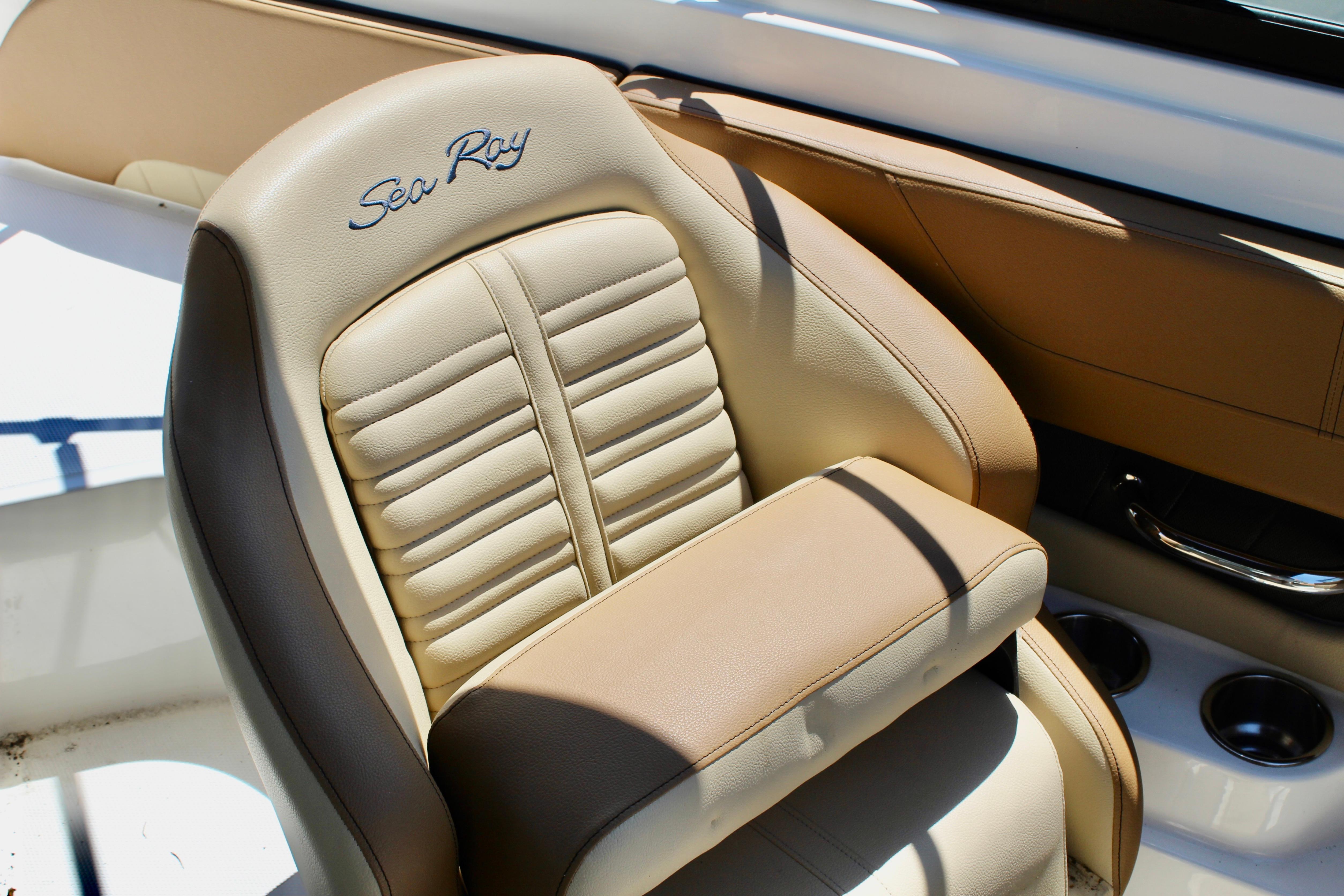 2018 Sea Ray SPX 190 Outboard boat seat, beige leather with embroidered logo.