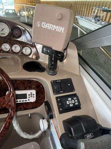 2005 Four Winns 298 Vista boat dashboard with Garmin GPS and control panel.