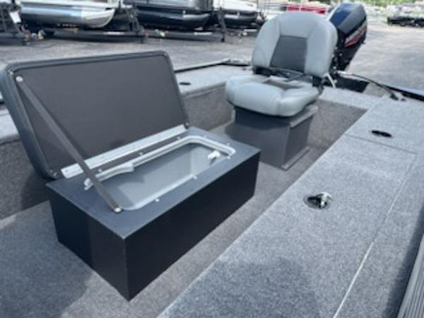 2025 Tracker Panfish 17 boat interior with storage compartment and seating.