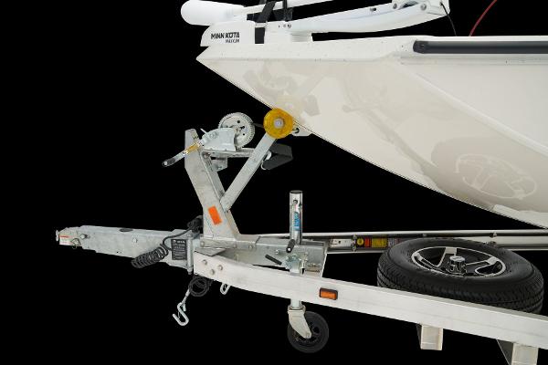 Manufacturer Provided Image: Manufacturer Provided Image: 2025 Ranger RB210 boat trailer with winch and spare tire, side view.