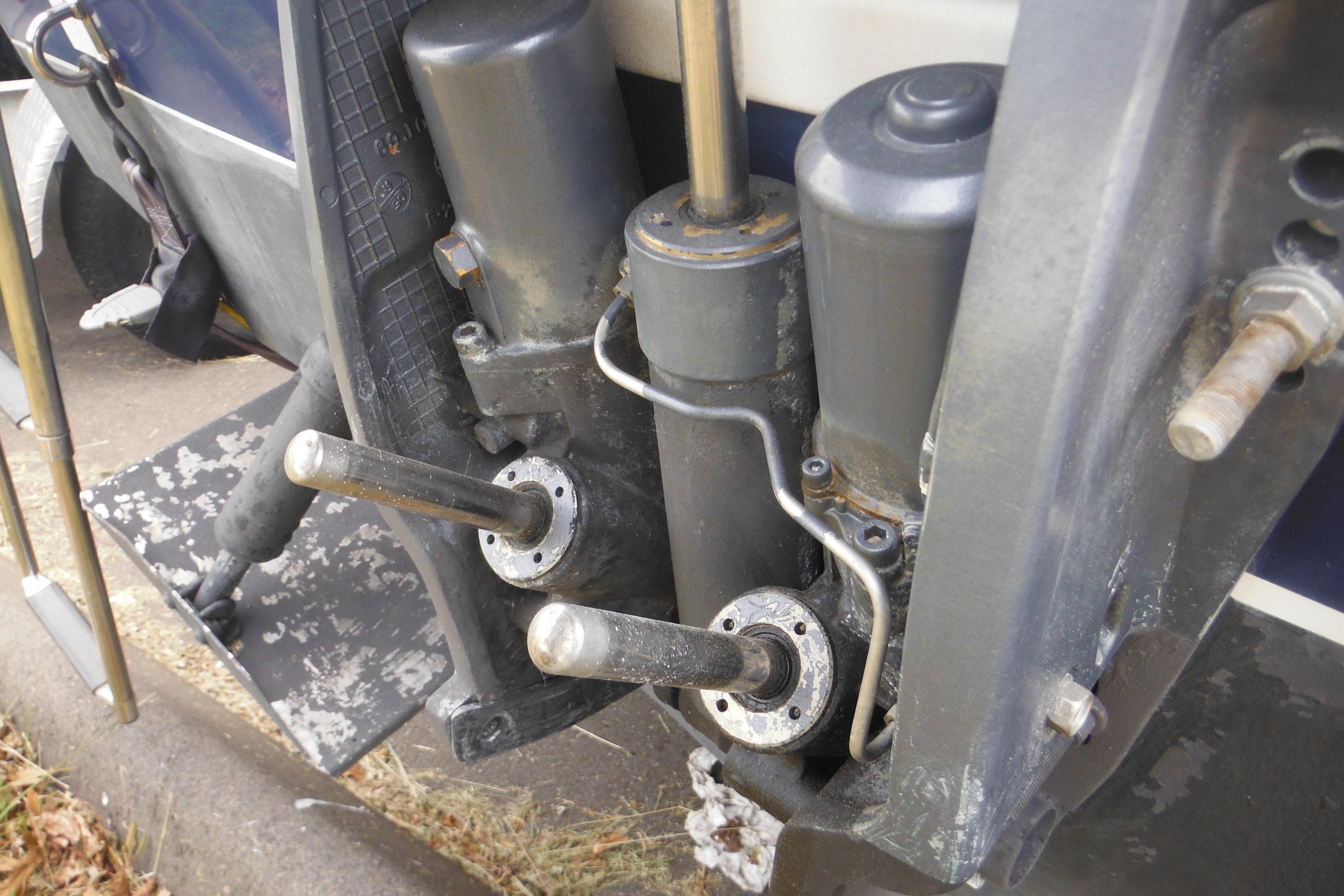 Close-up of 2005 Seaswirl Striper 2101 Walkaround O/B boat engine components.