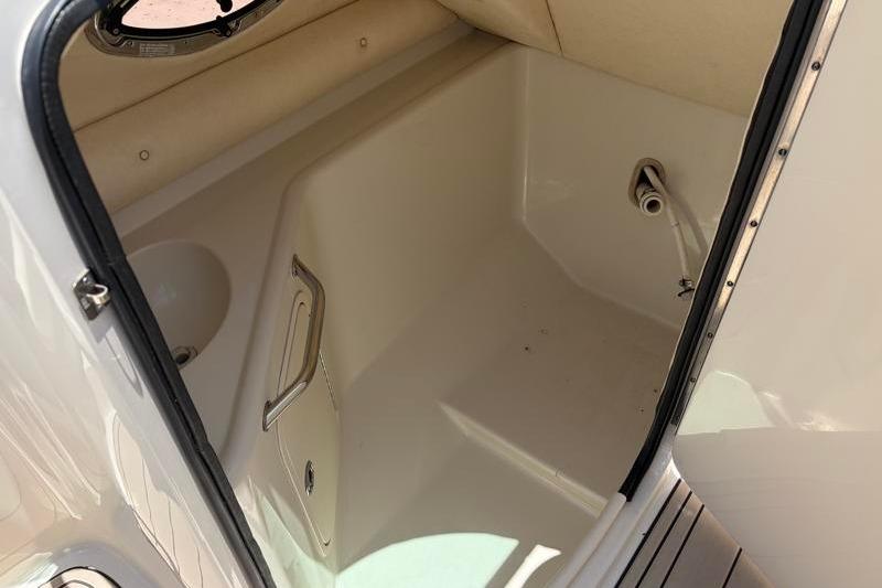Interior view of a 2007 Sea Ray 240 Sundeck boat compartment.
